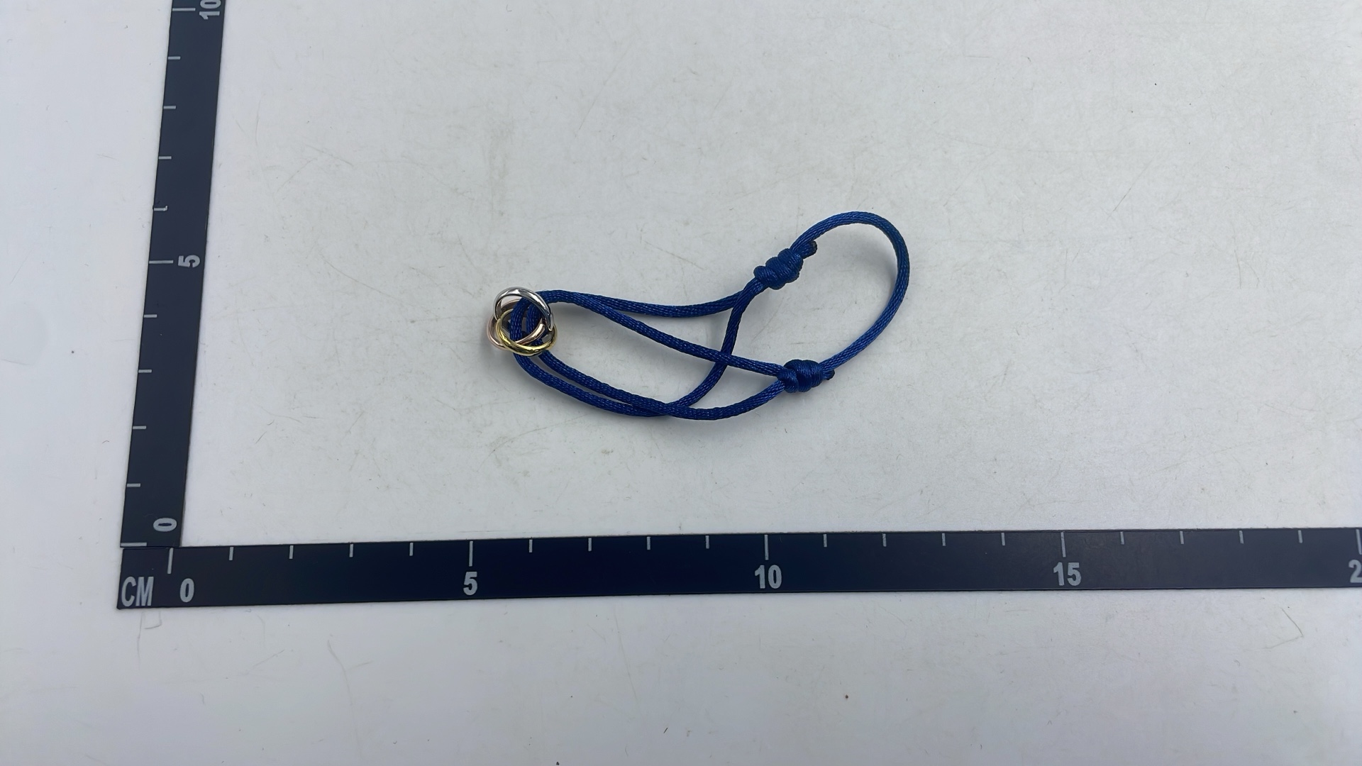 Cartier Trinity Ring with White Cord