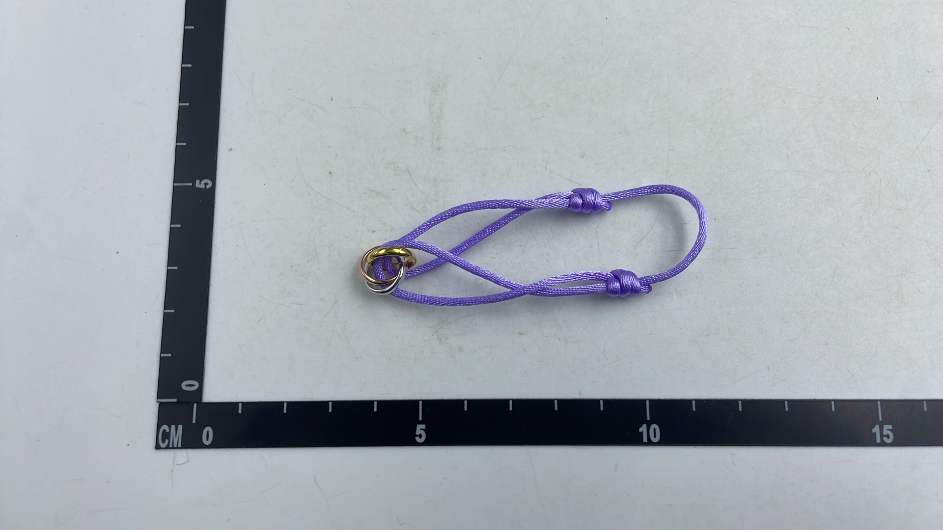 Cartier Trinity Ring with White Cord