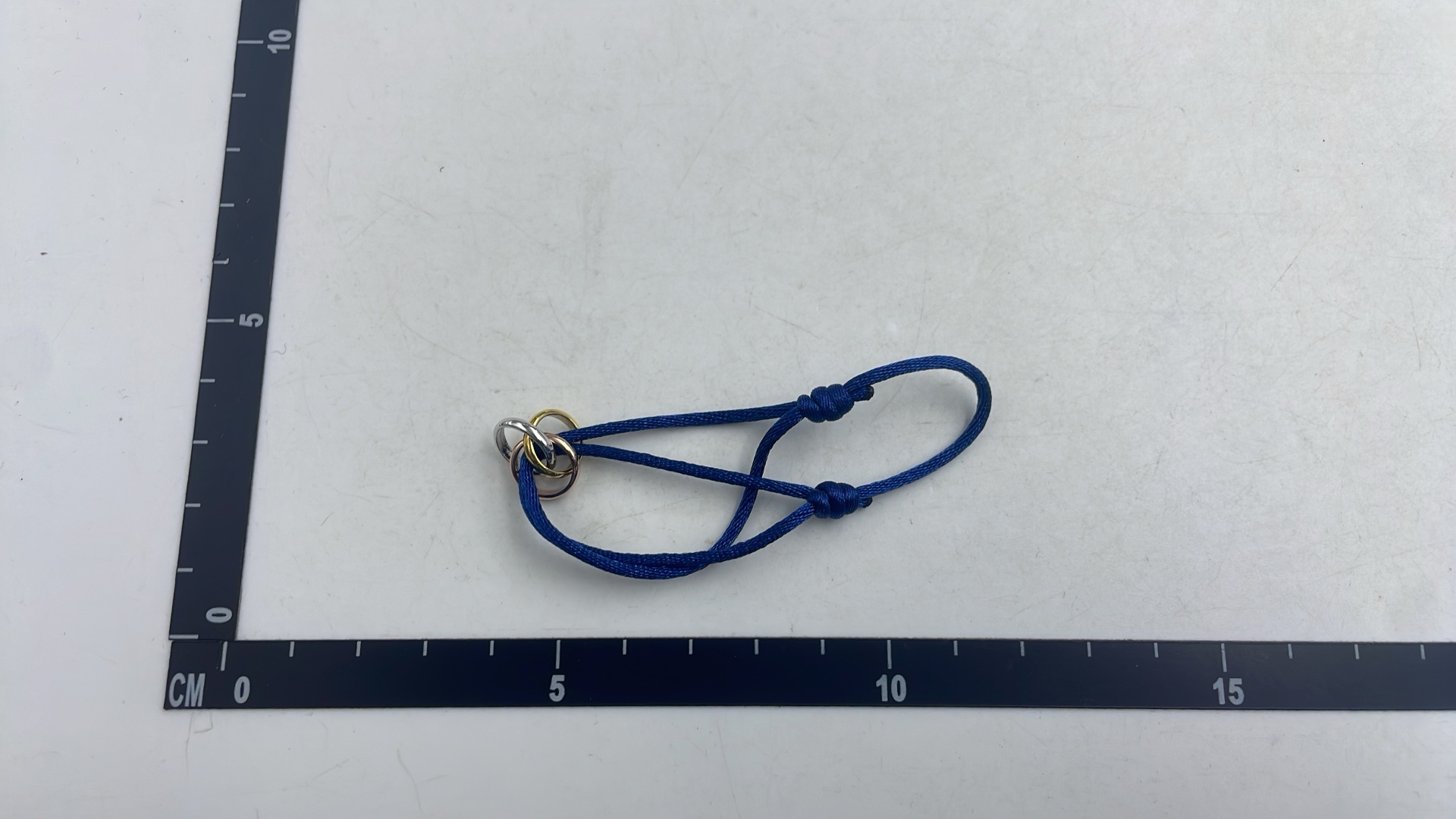 Cartier Trinity Ring with White Cord