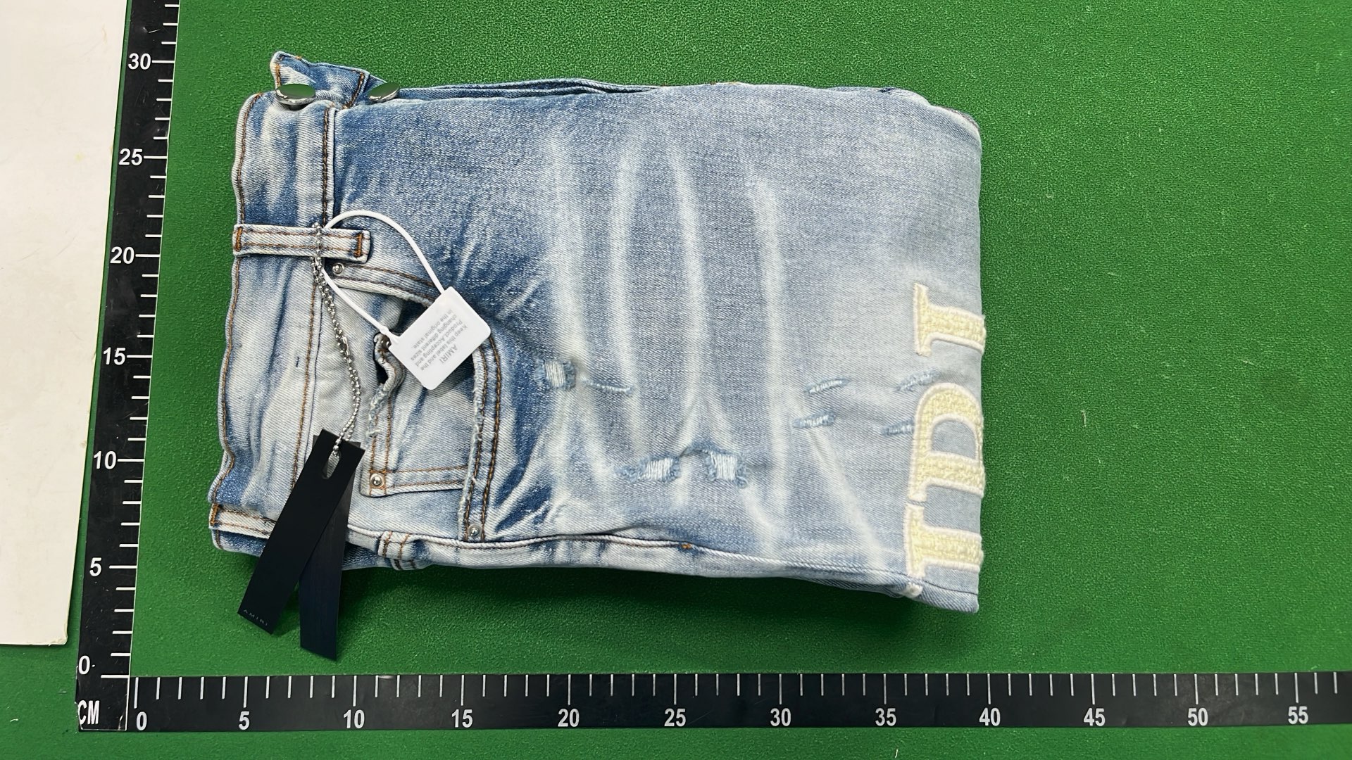 IRI Distressed Denim Jeans with Patched Holes