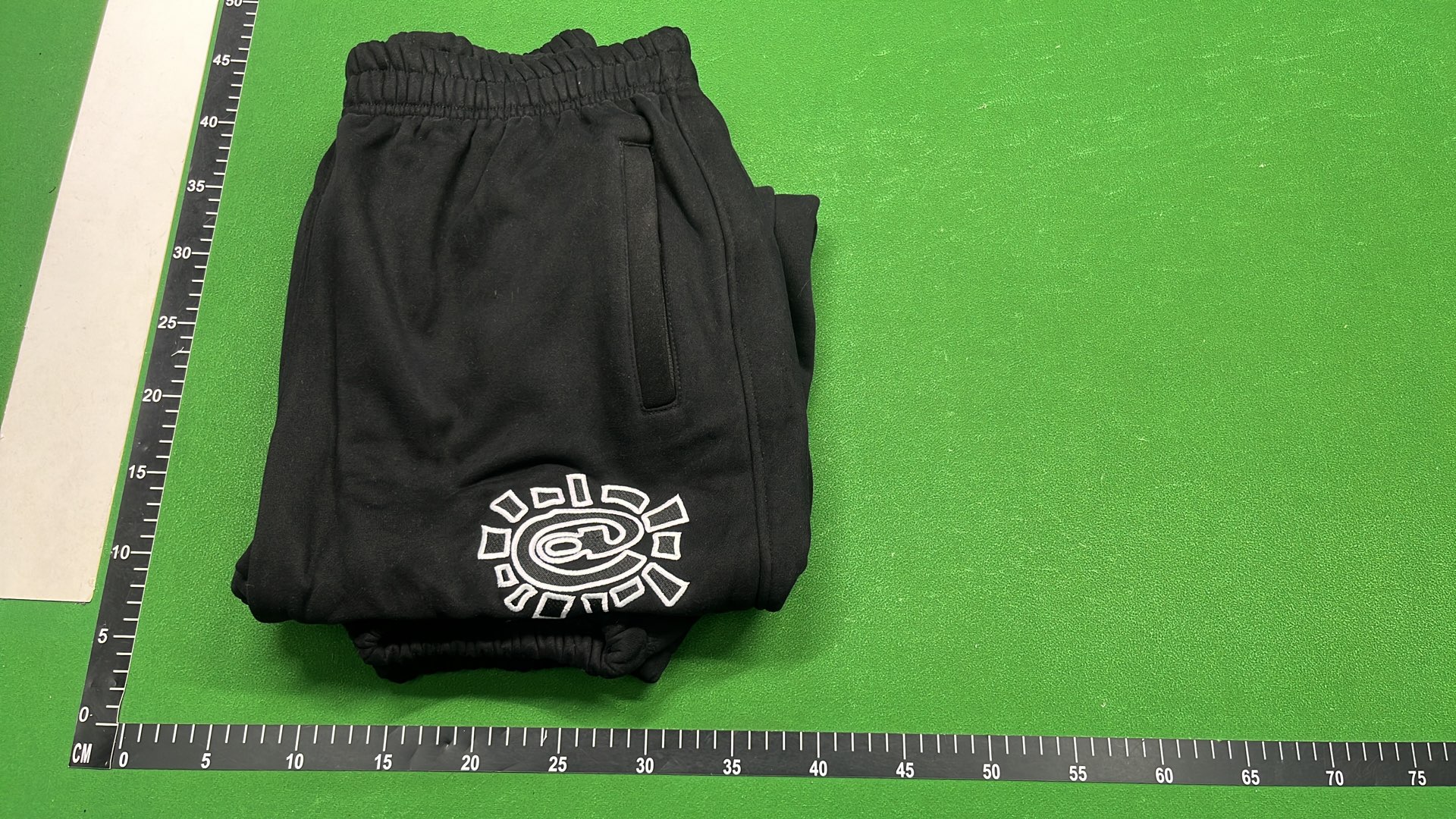 Black Hugo Sweatpants with Unique Logo Design