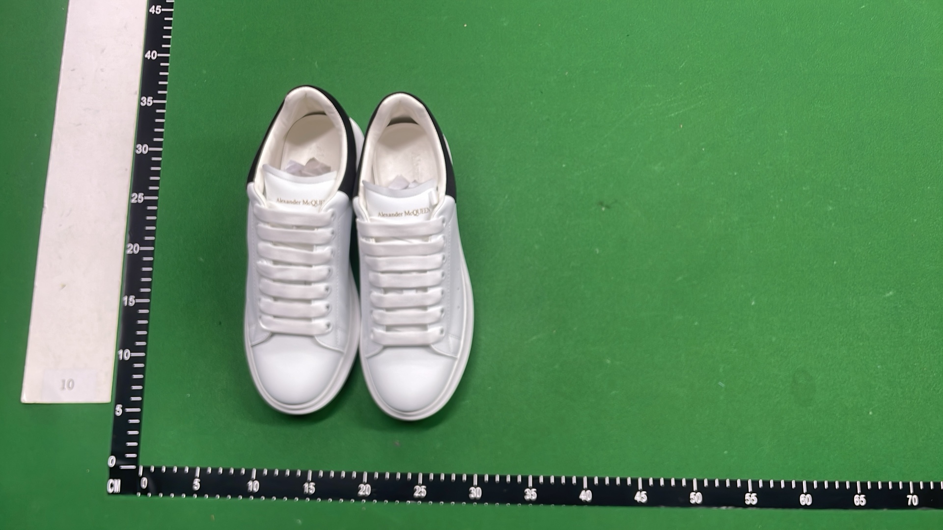 Alexander McQueen White Sneakers with Black Heel Tab