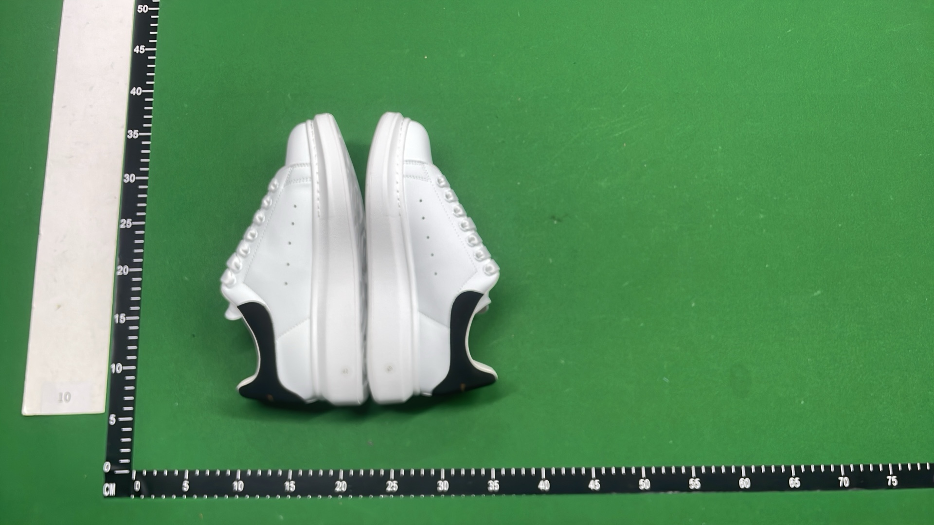 Alexander McQueen White Sneakers with Black Heel Tab
