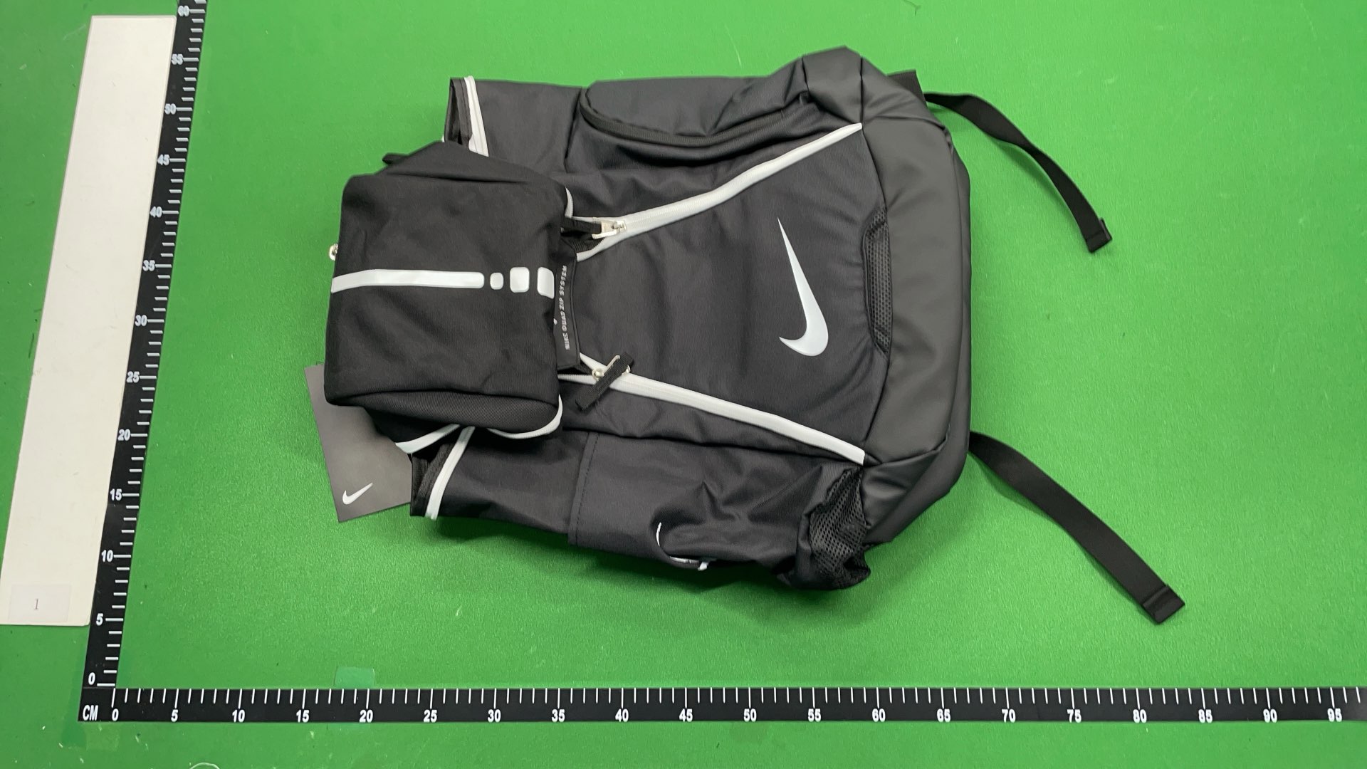 Nike Black Backpack with Gold Swoosh and Quad Zip System