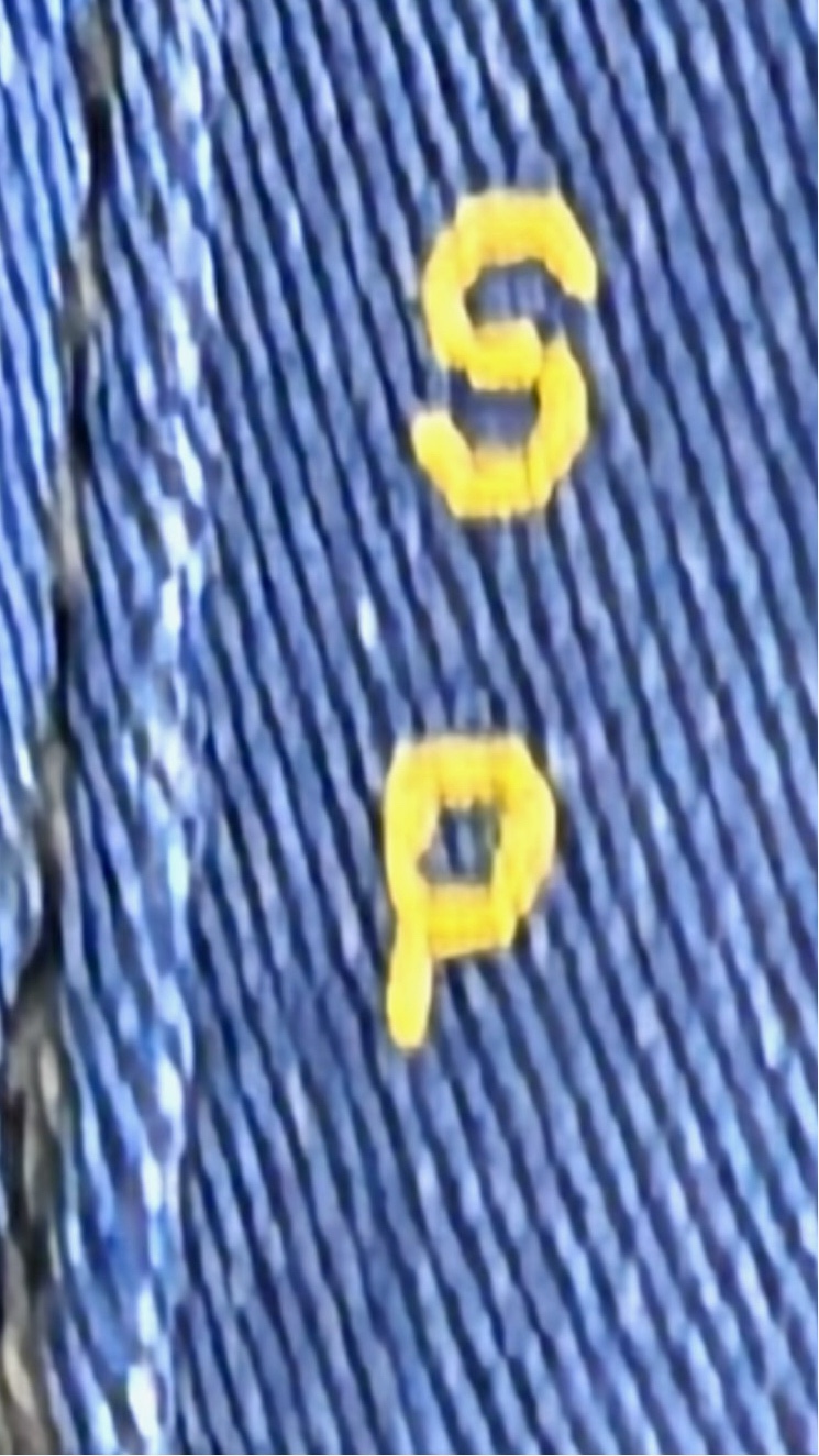 Pink Polo Shirt with Blue Logo
