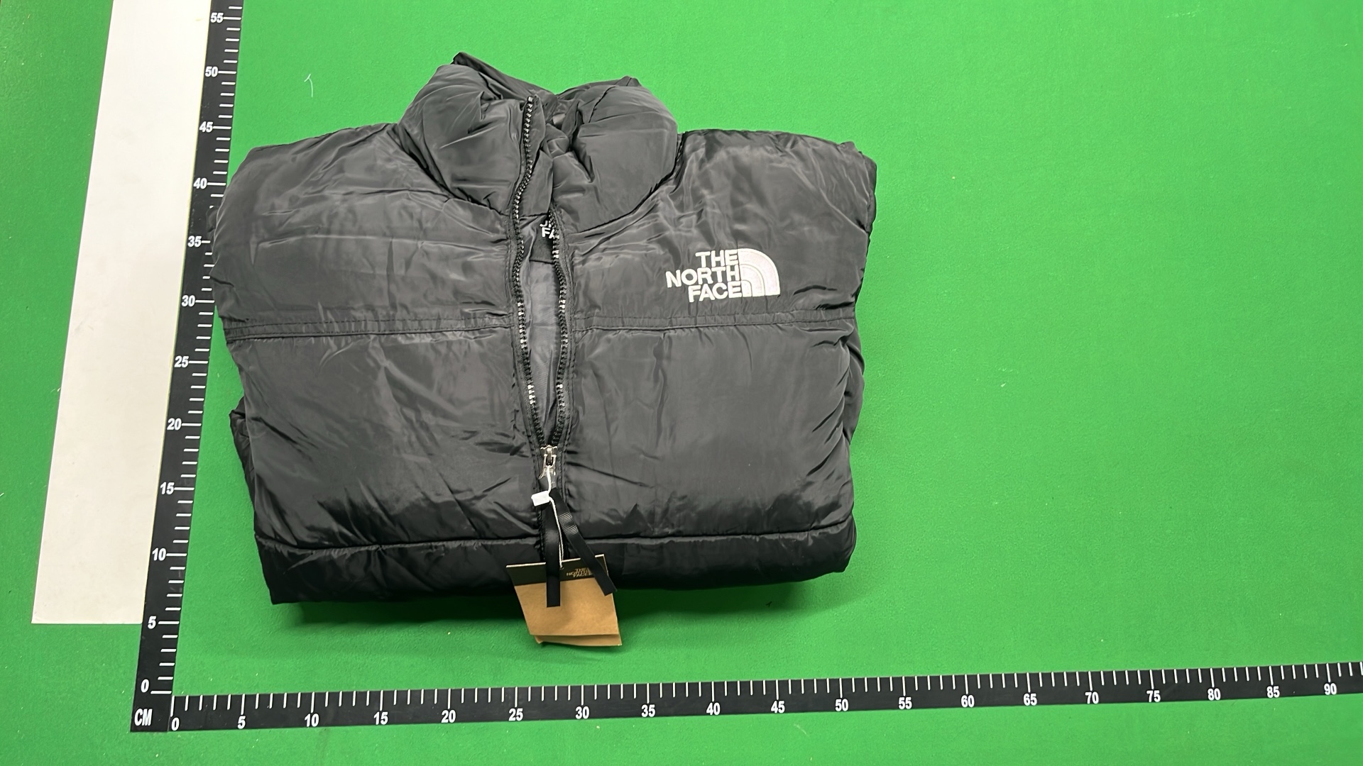 The North Face White Puffer Jacket with Black Hood
