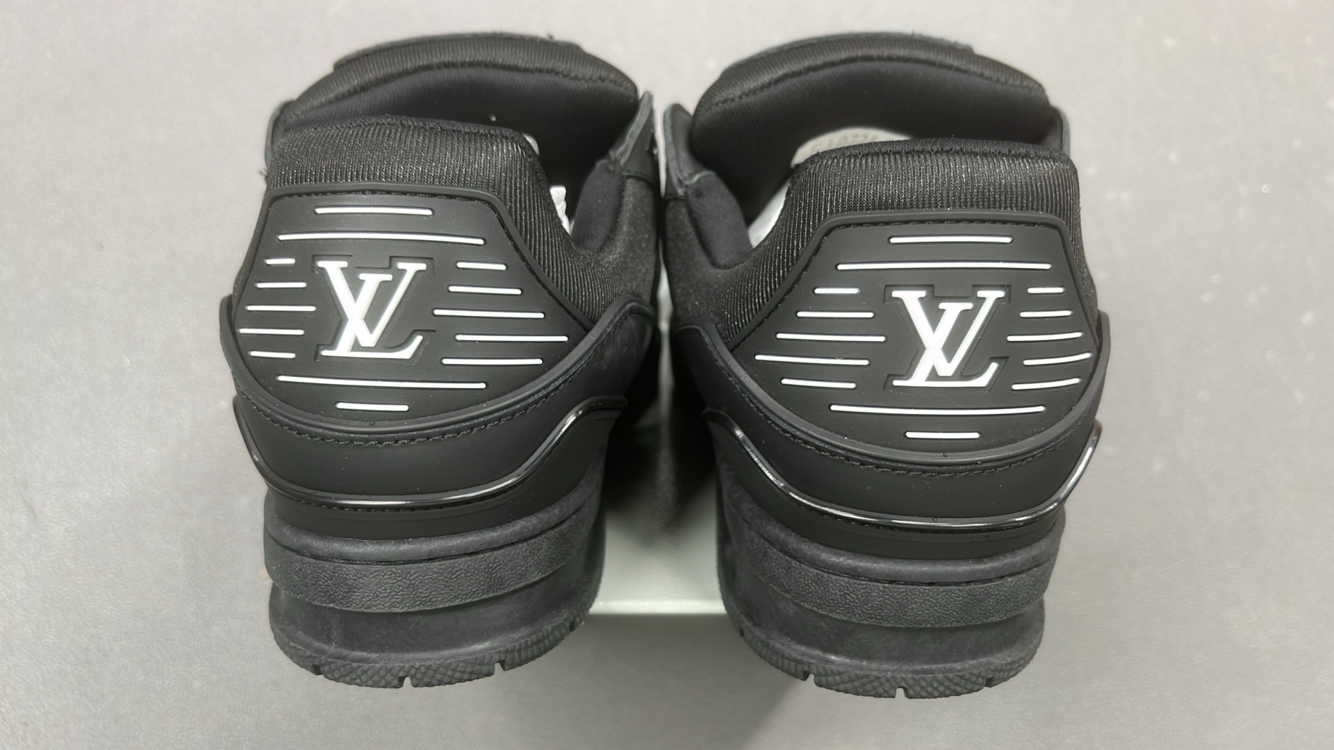 White and Green VUITTON Sneakers with Bold Logo Design