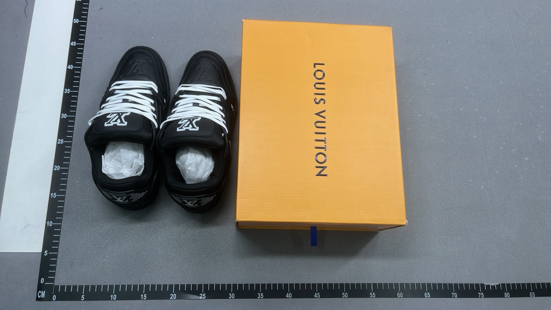 White and Green VUITTON Sneakers with Bold Logo Design