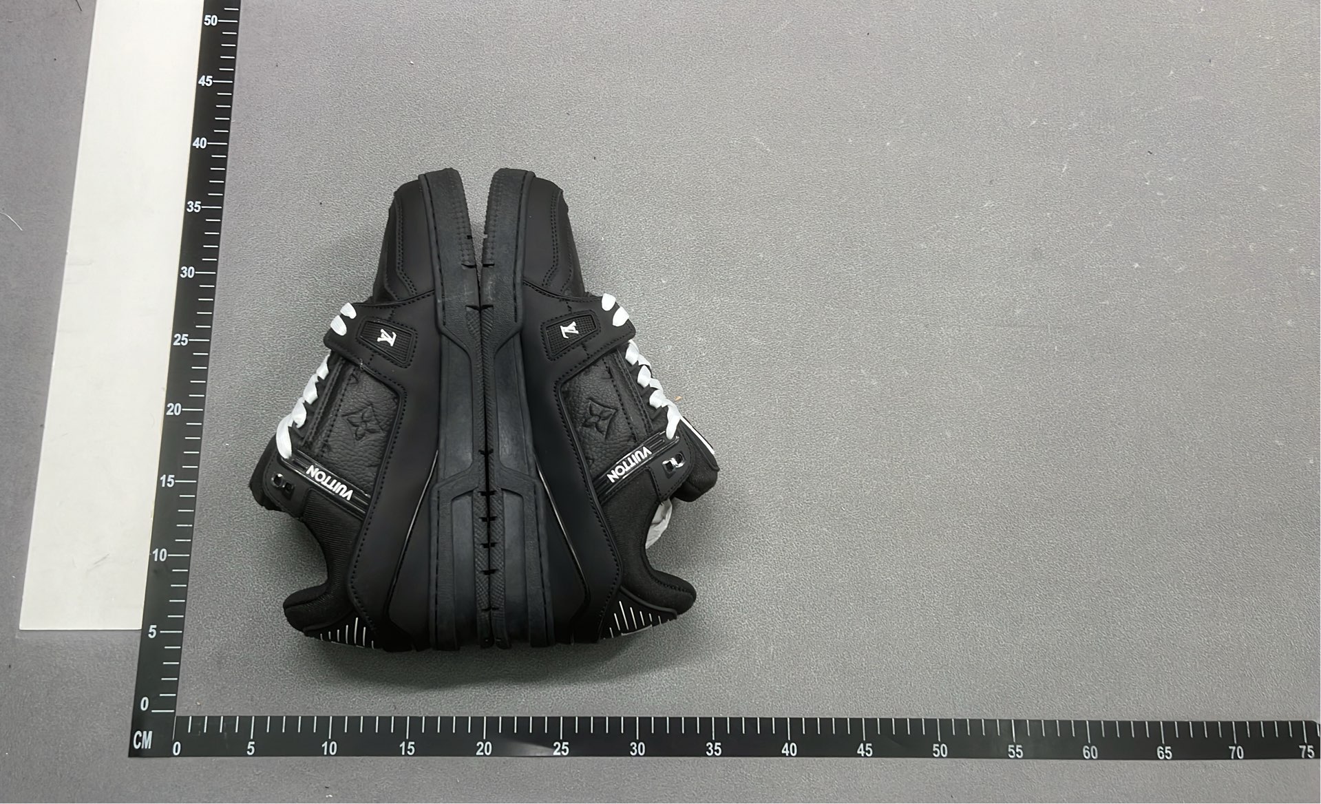 White and Green VUITTON Sneakers with Bold Logo Design