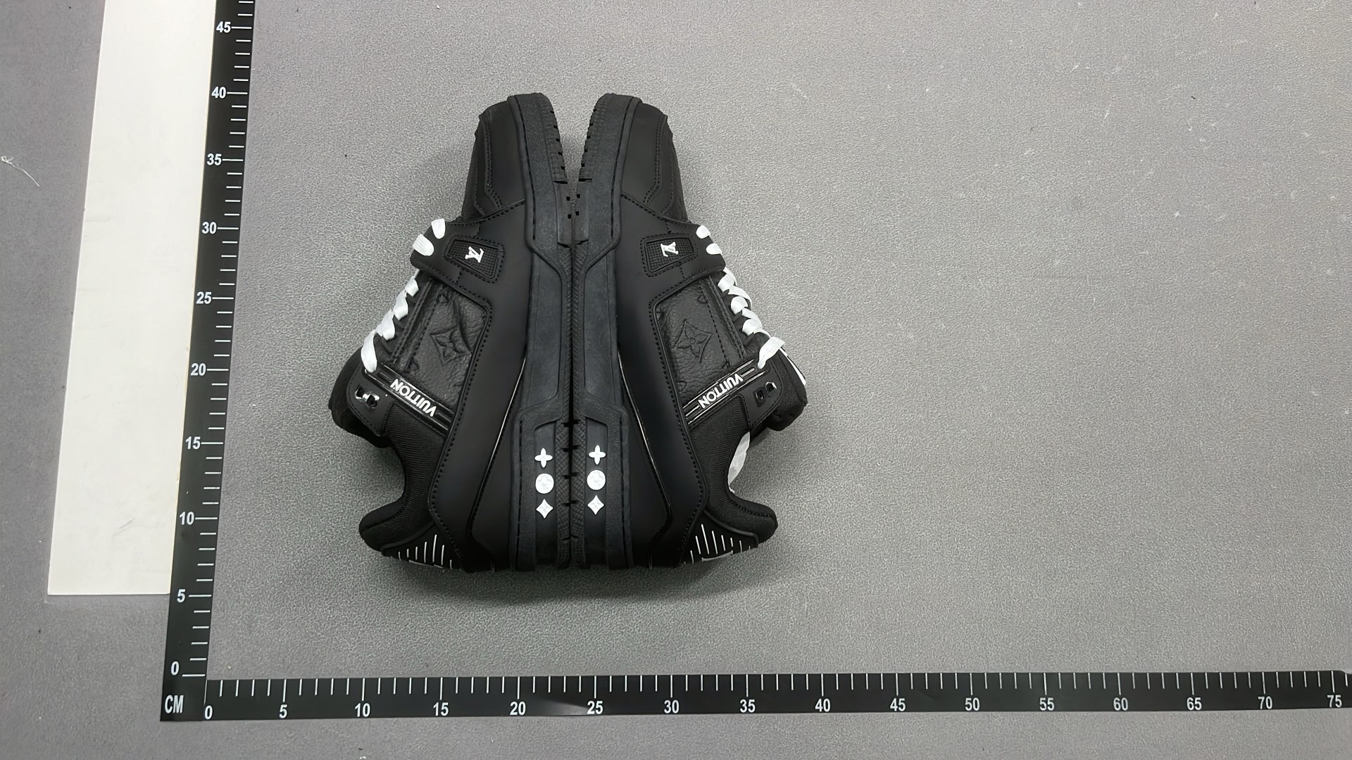 White and Green VUITTON Sneakers with Bold Logo Design
