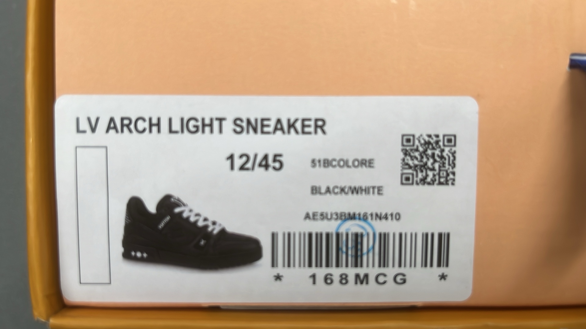 White and Green VUITTON Sneakers with Bold Logo Design