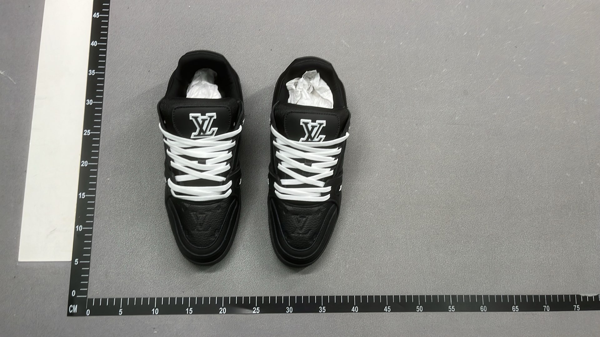 White and Green VUITTON Sneakers with Bold Logo Design