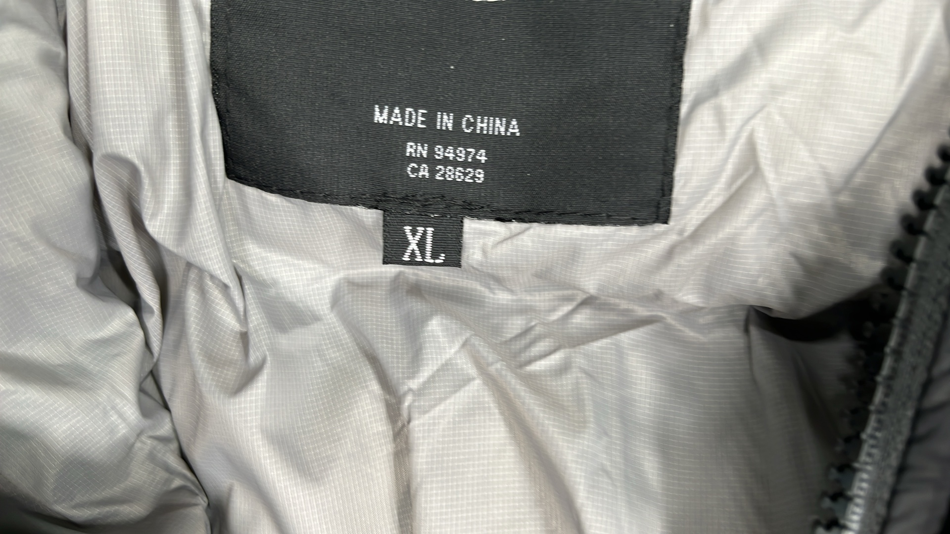 Stussy Black Puffer Jacket with Pink Lining