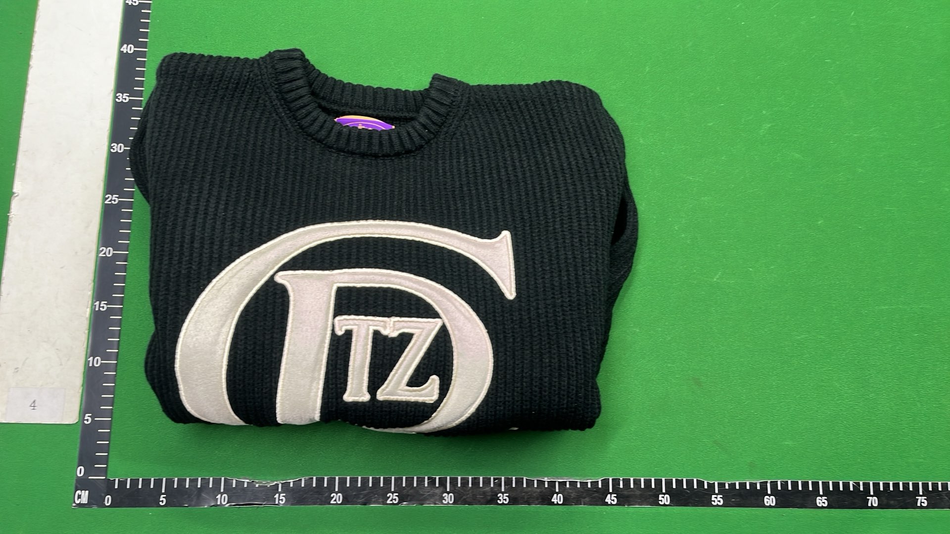 Lacoste Black Ribbed Sweater with Graphic Logo Design
