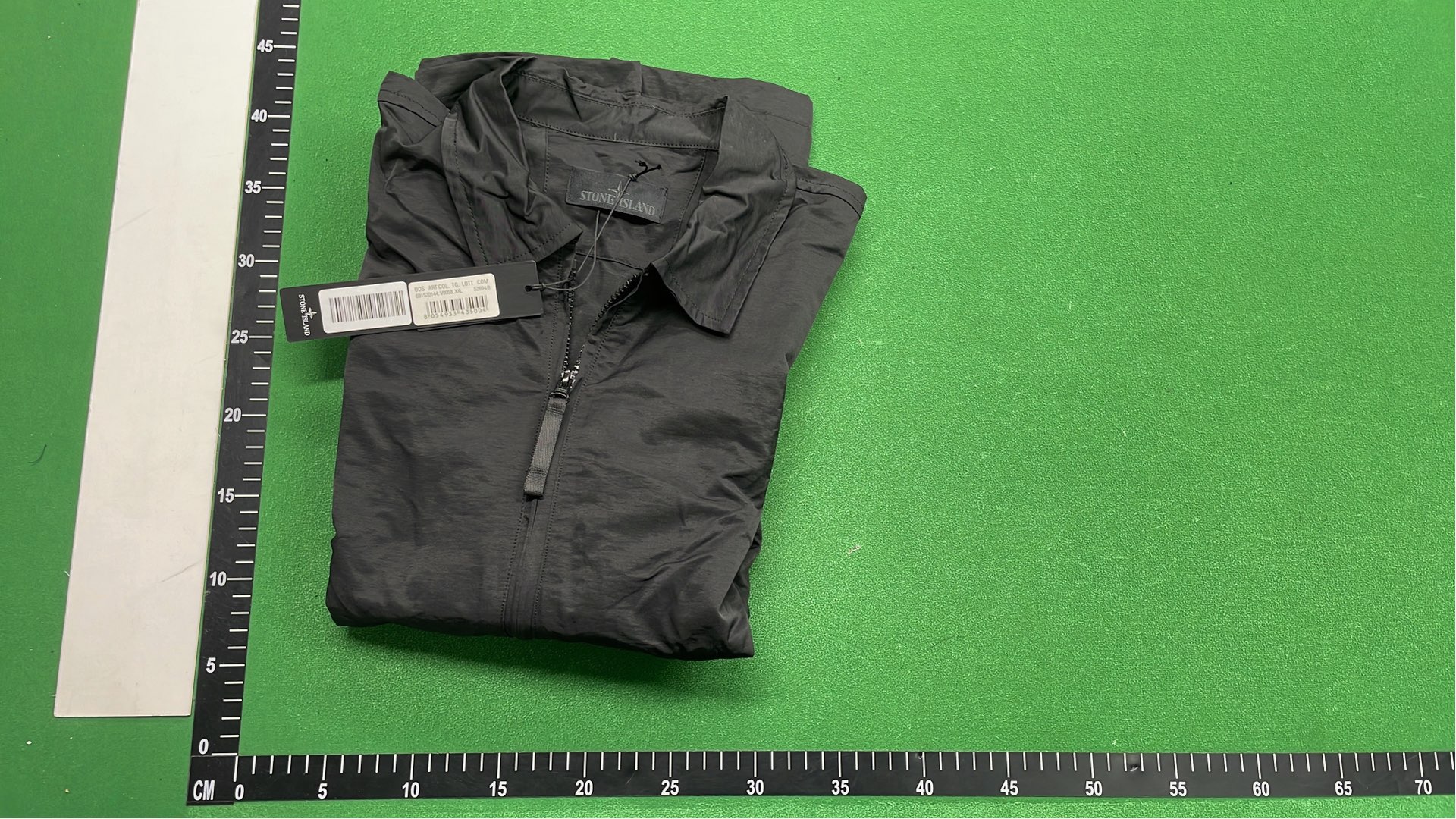 Black Zip-Up Jacket with Two Front Pockets