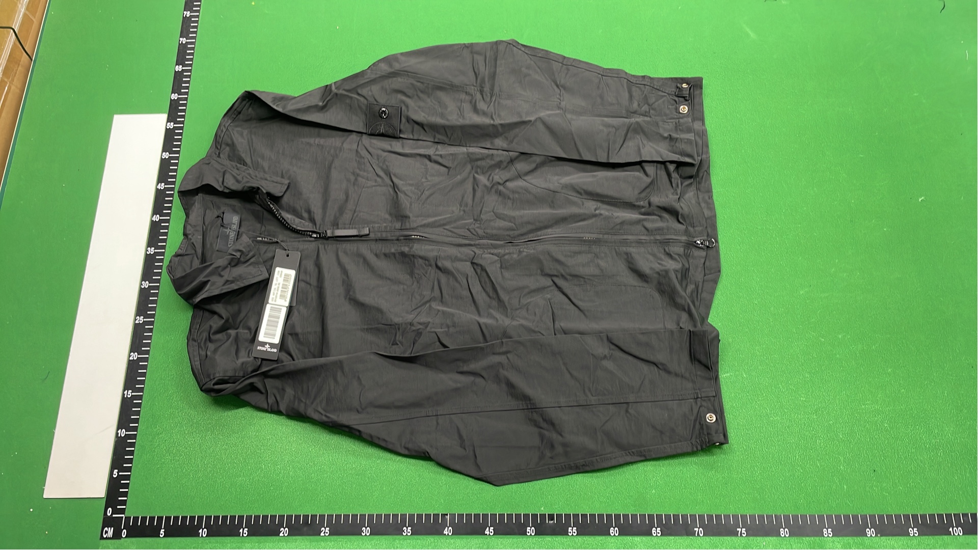 Black Zip-Up Jacket with Two Front Pockets