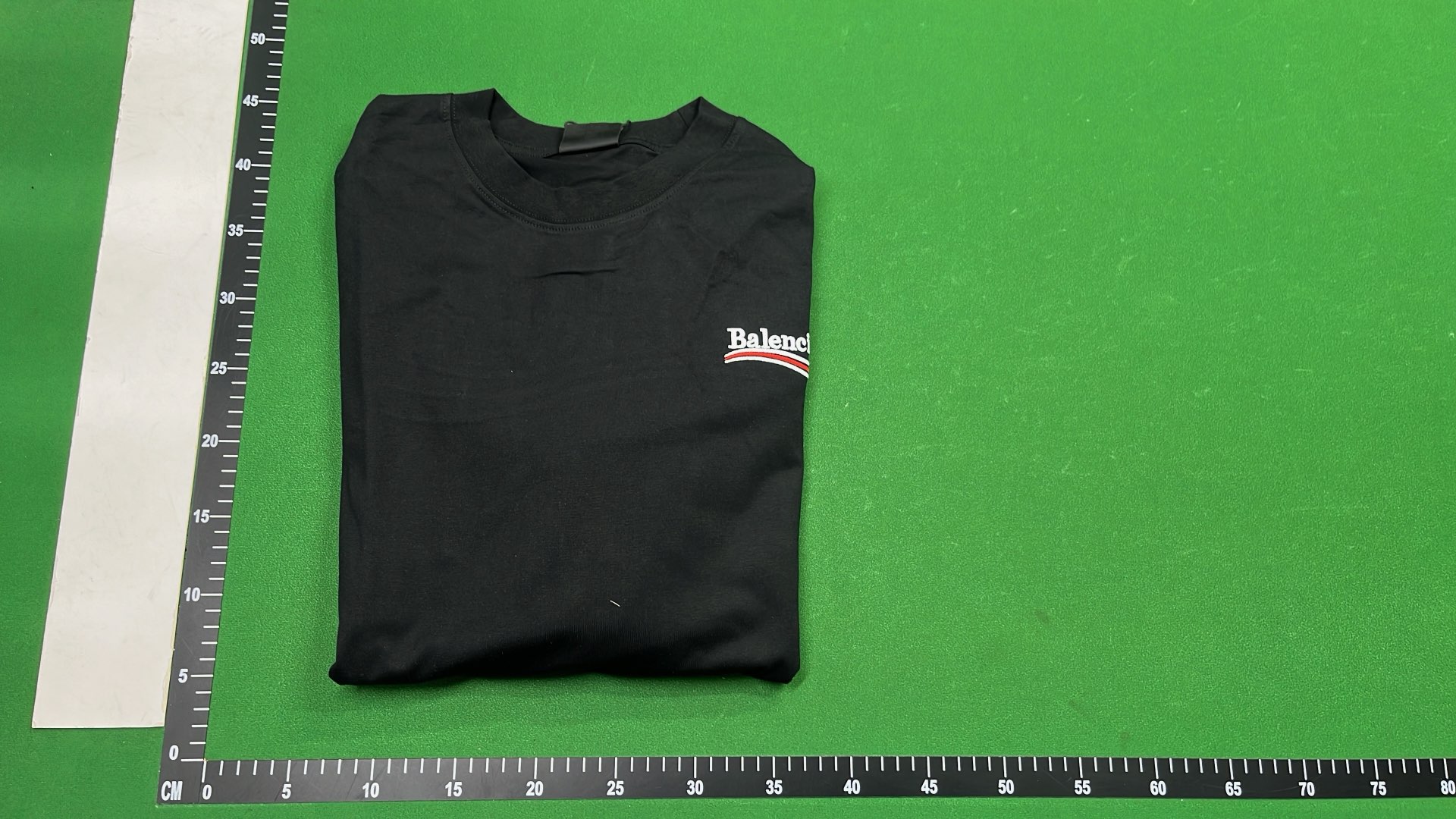 Balenciaga Black Oversized T-Shirt with Checkered Sleeve Detail