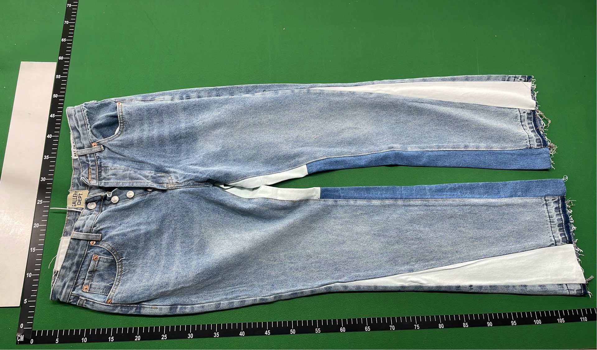 Vintage Patchwork Denim Jeans with Frayed Hem and Cream Accents