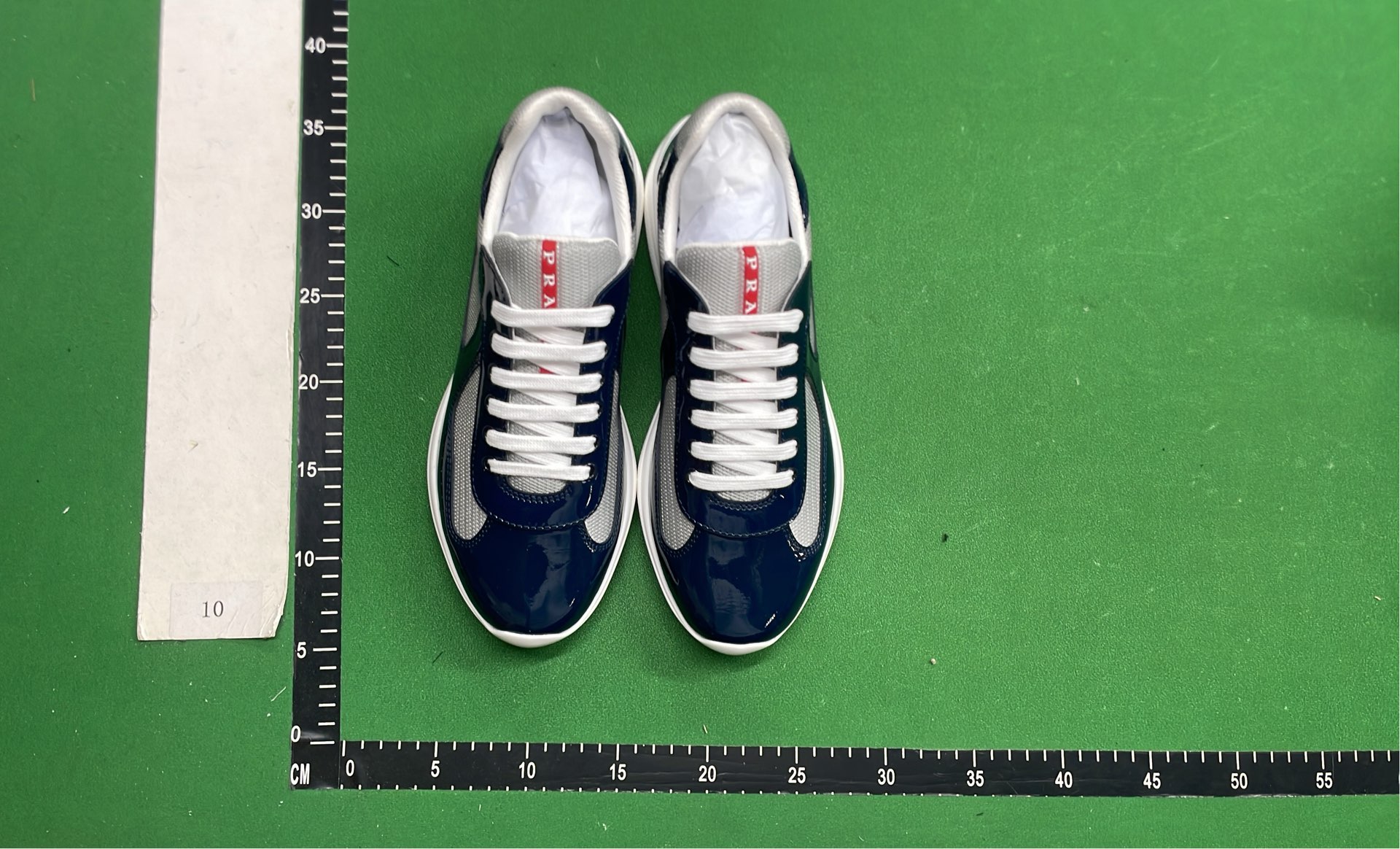 Grey Patent Leather Sneakers with White Sole and Red Heel