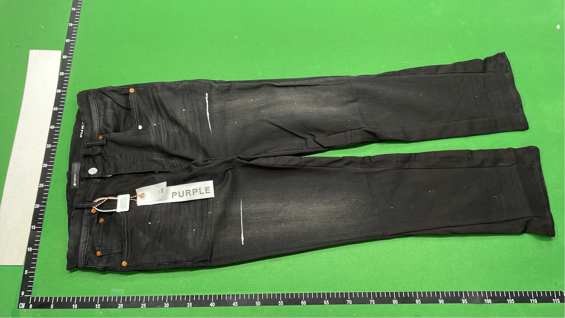 Black Flared Jeans with Paint Splatter Design