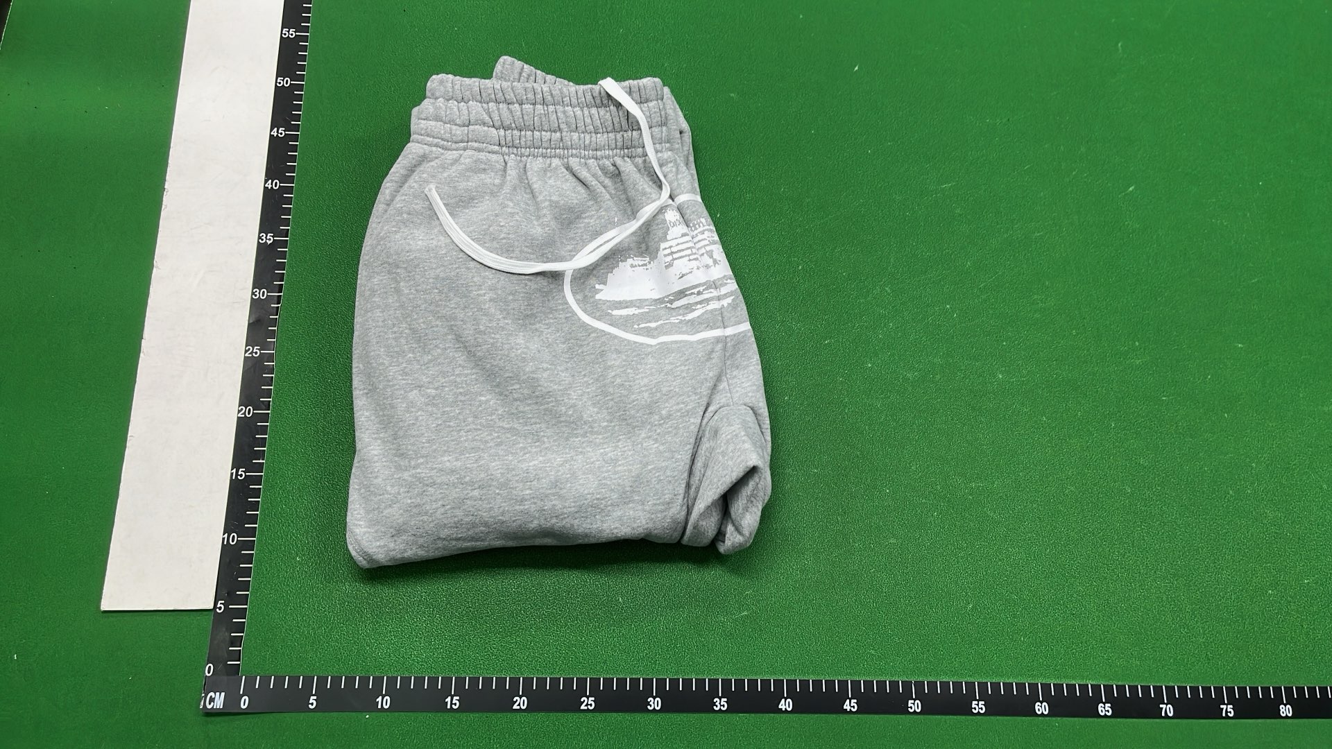 Gray Sweatpants with White Logo Design