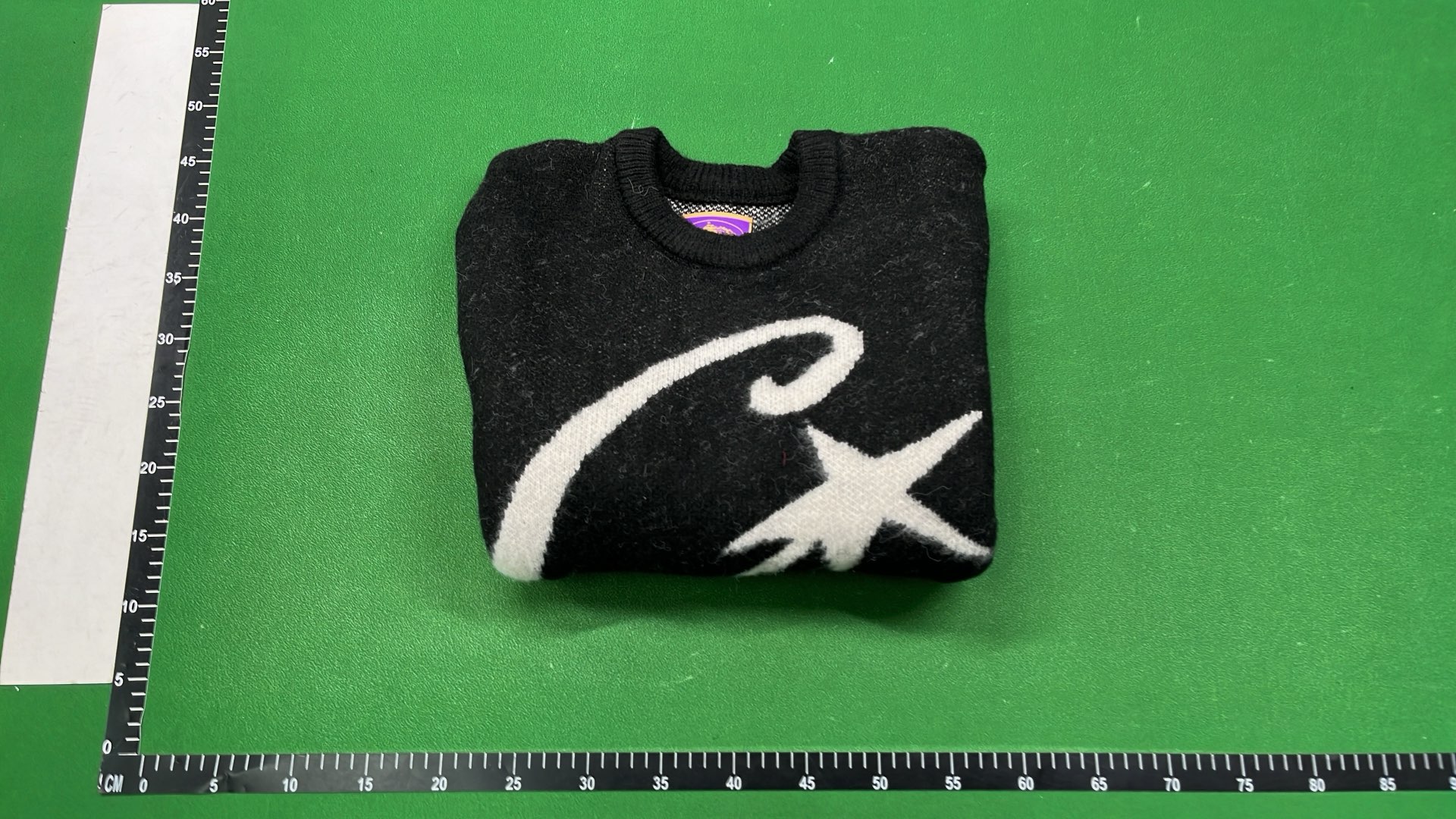 Black CJ Logo Sweater with White Star Design
