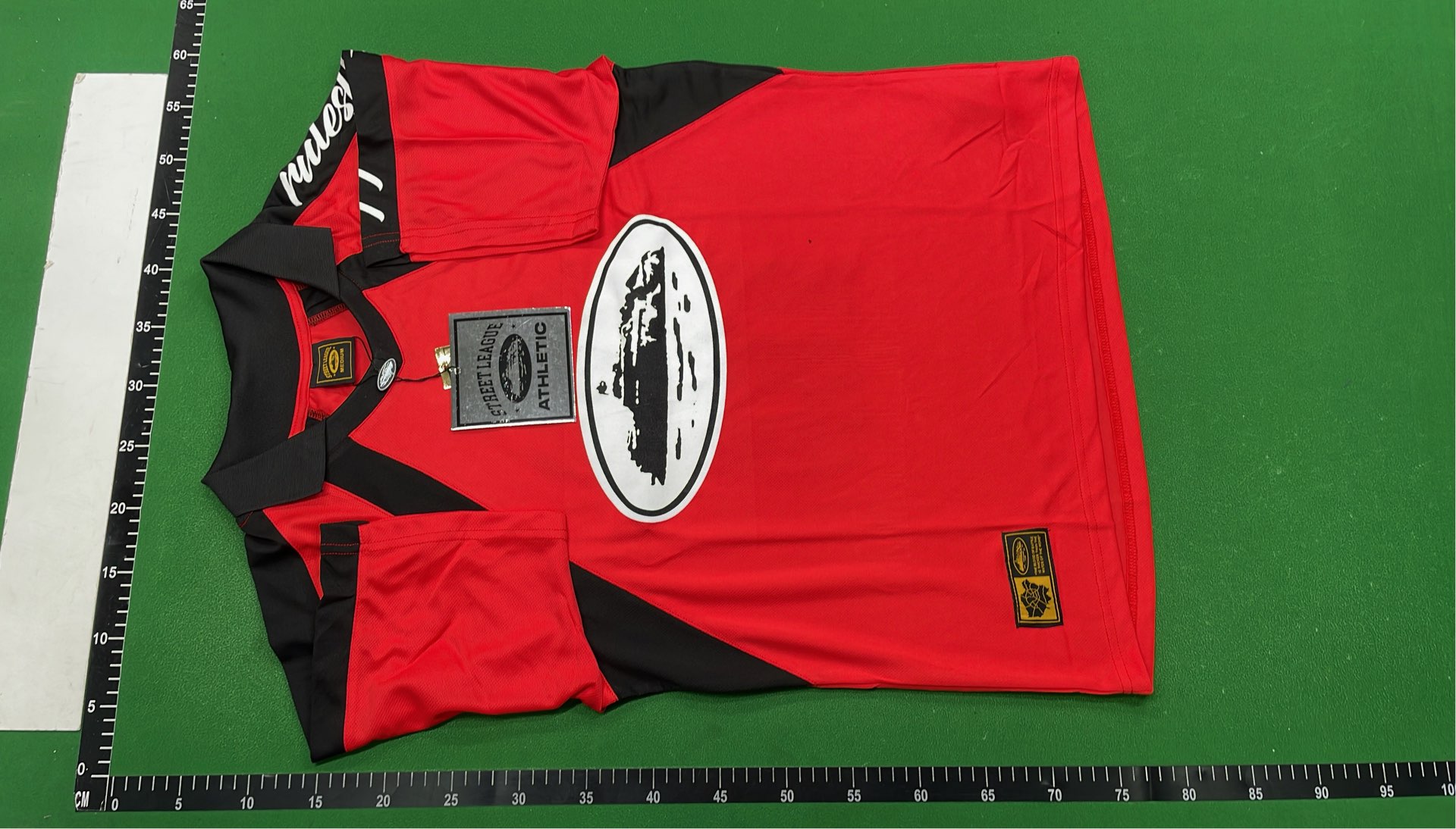 Red and Black Cortez Jersey with 'rulestheworld' Sleeve Design