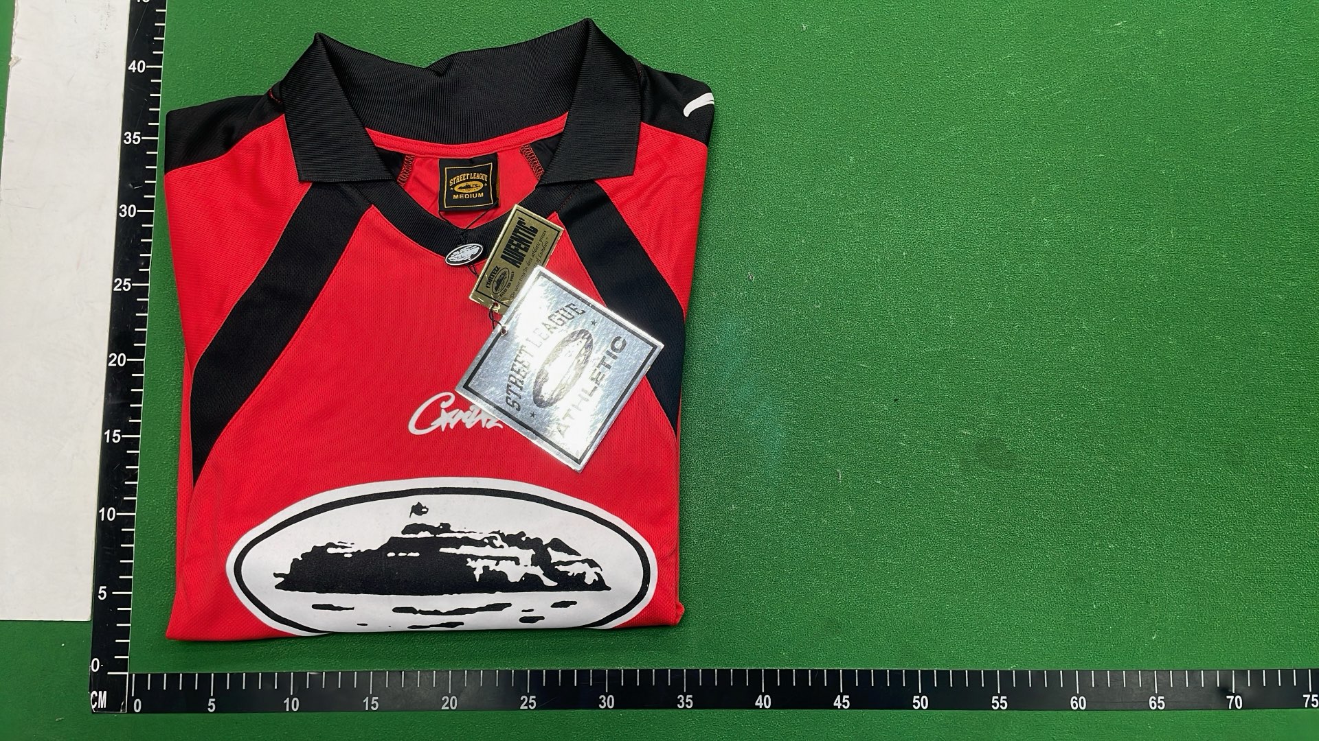 Red and Black Cortez Jersey with 'rulestheworld' Sleeve Design