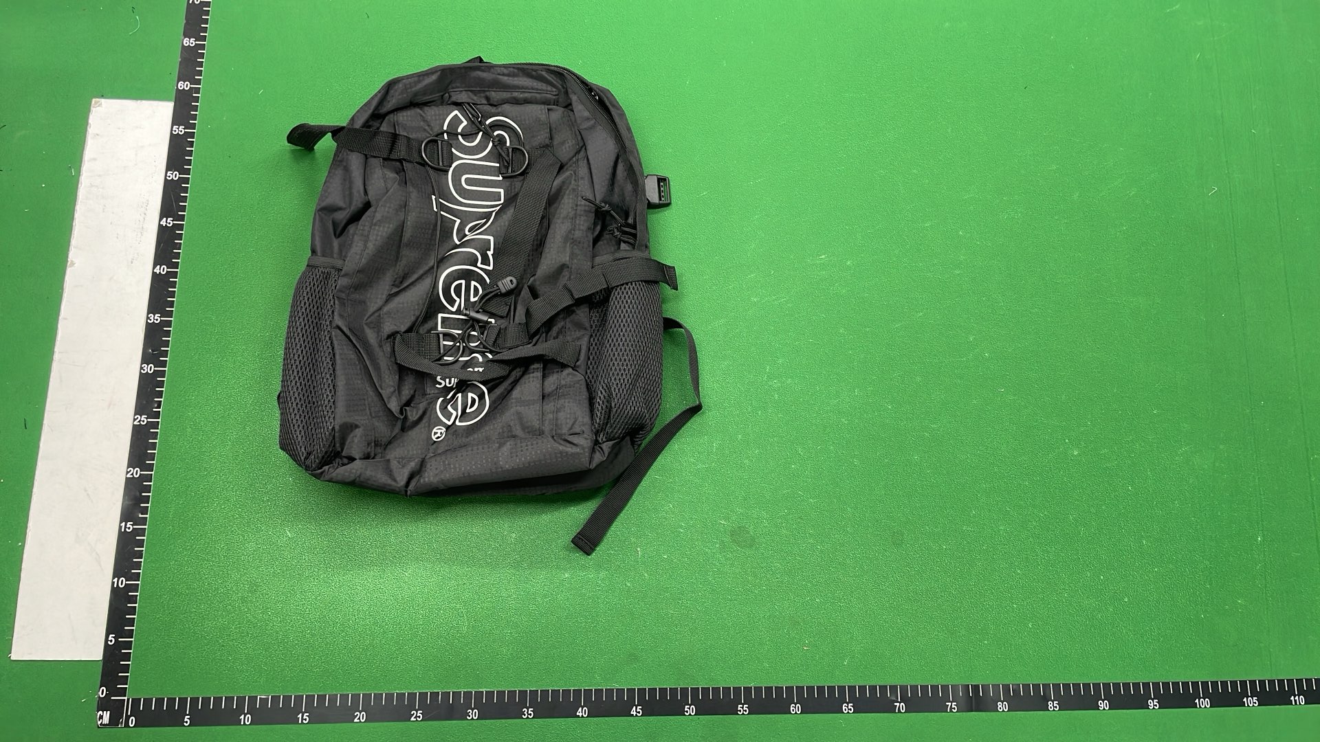 Supreme Backpack in Red Purple Yellow Black