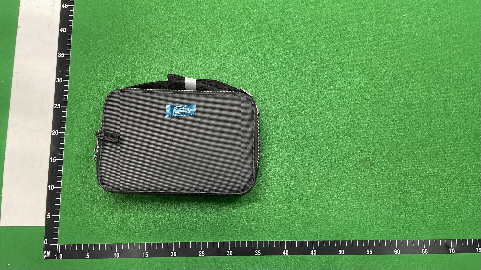 Lacoste Black Crossbody Bag with Zip Closure and Adjustable Strap
