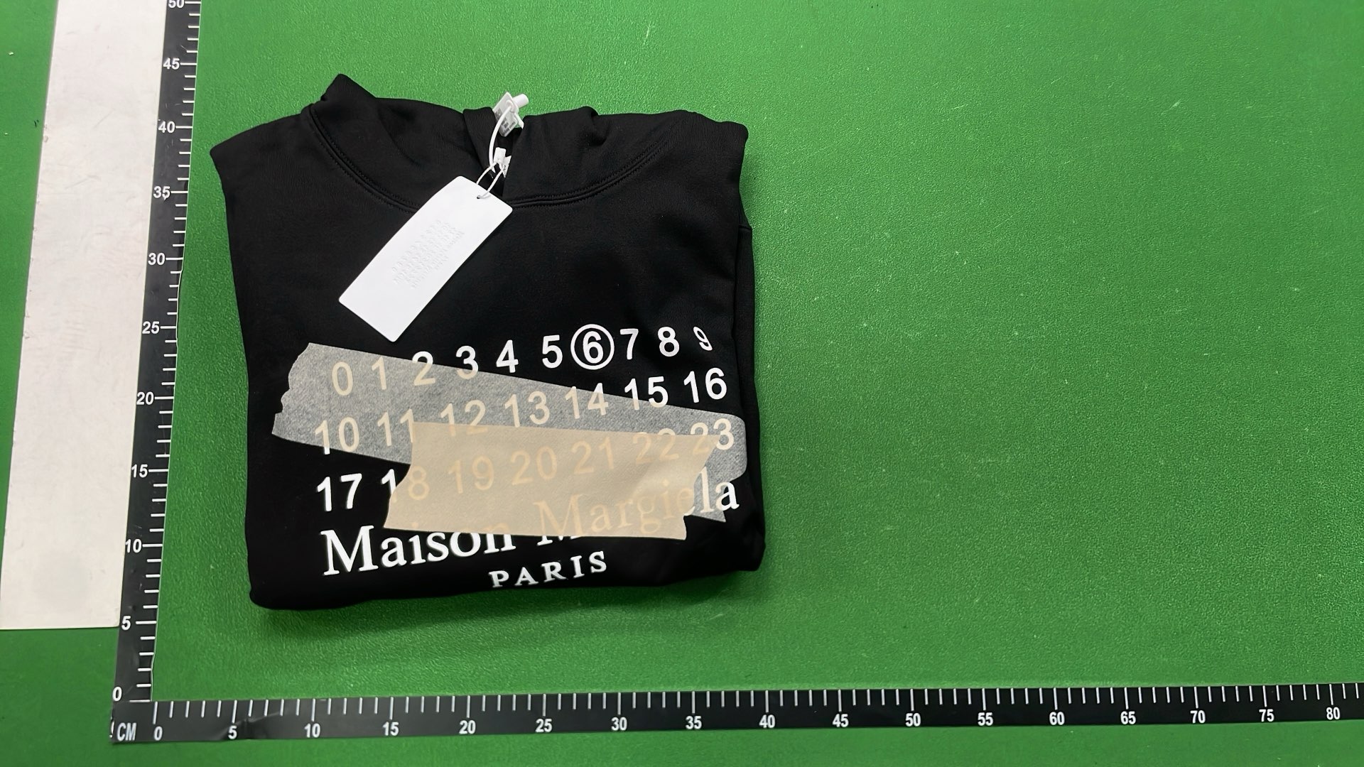 Black Hoodie with Number Pattern Design