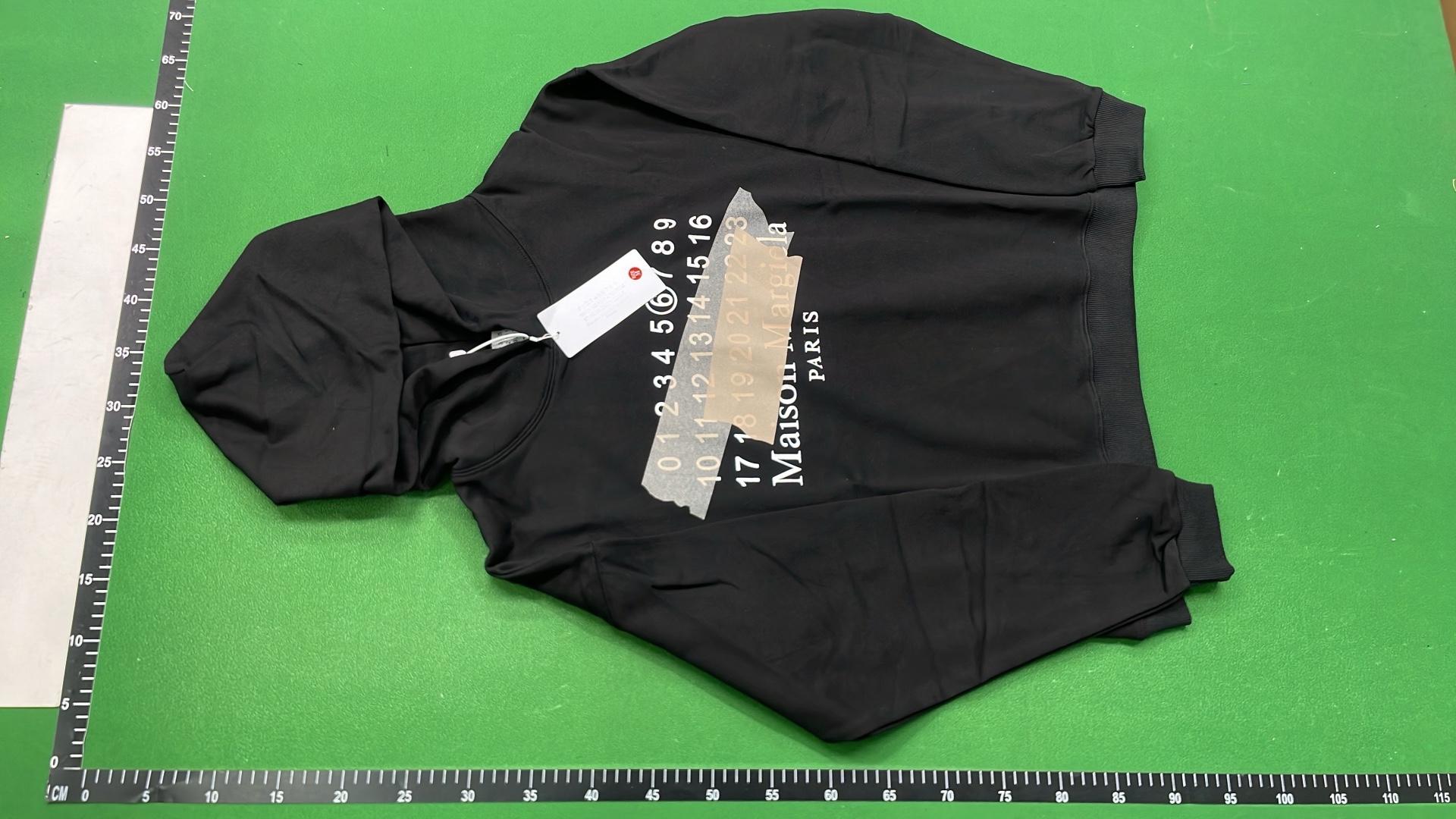 Black Hoodie with Number Pattern Design