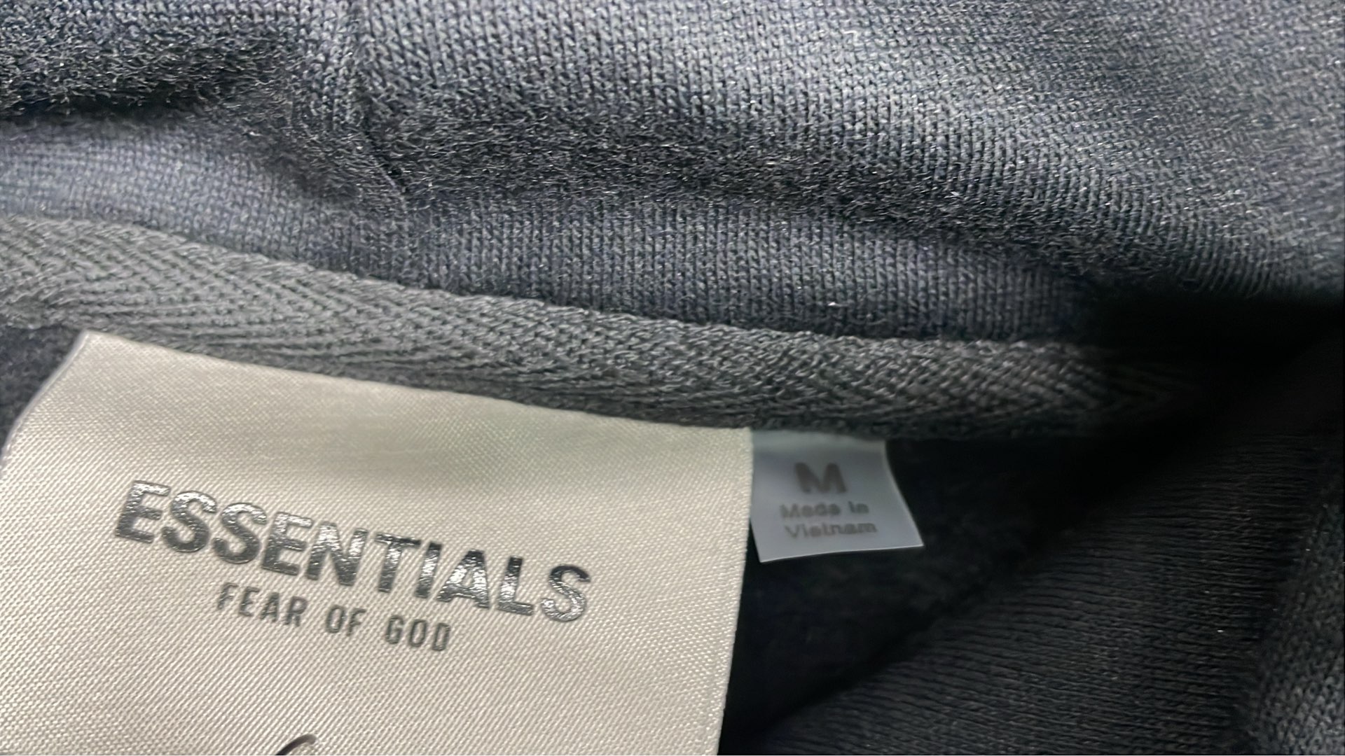 Essentials Black Hoodie - Minimalist Streetwear Design