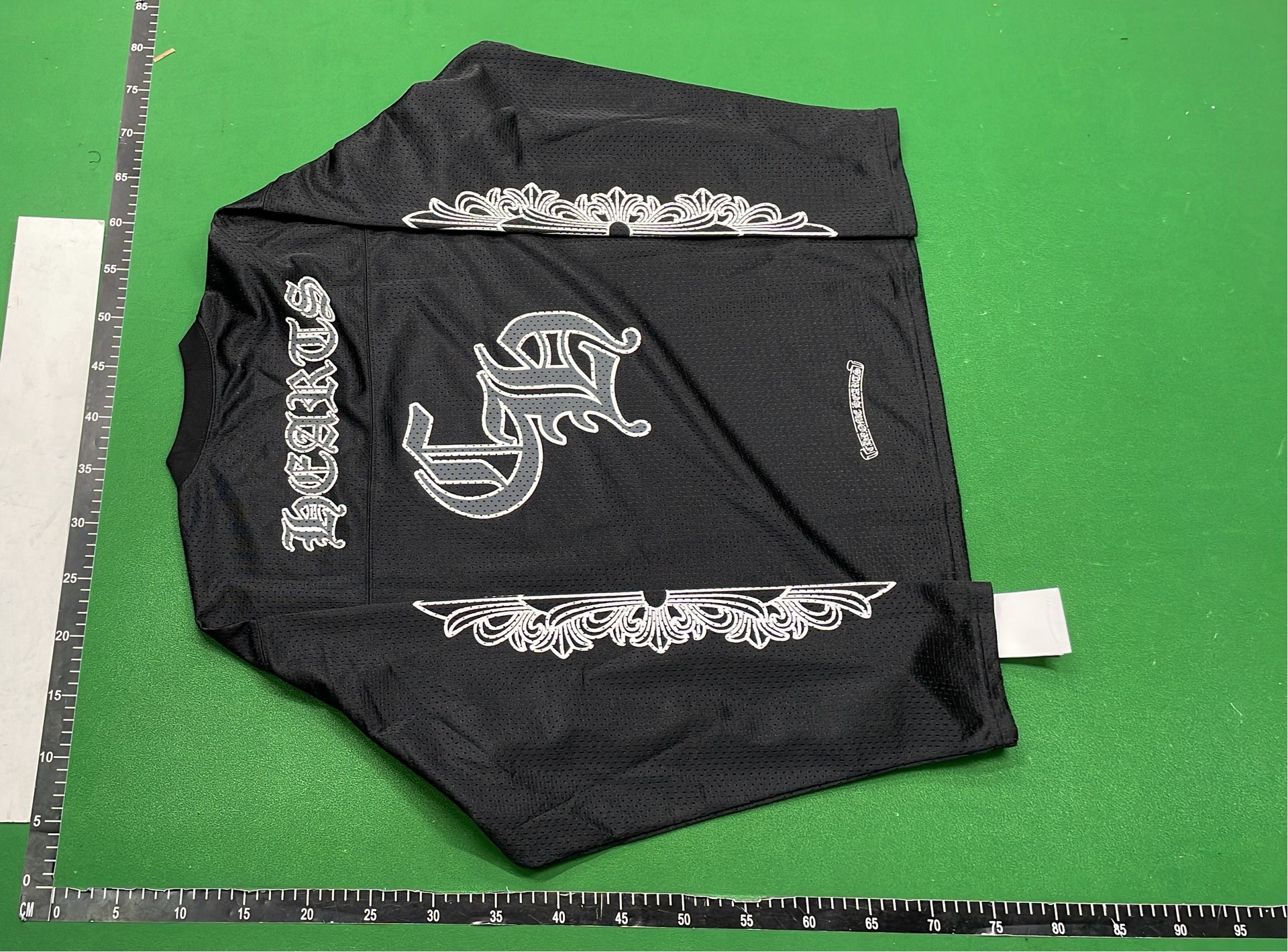 Red Form Jersey with Ornate Sleeve Designs