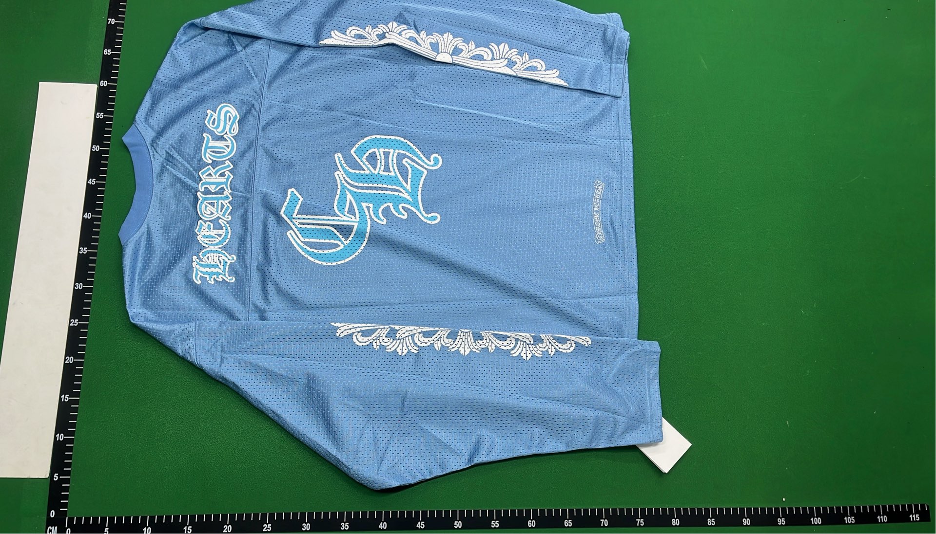Red Form Jersey with Ornate Sleeve Designs