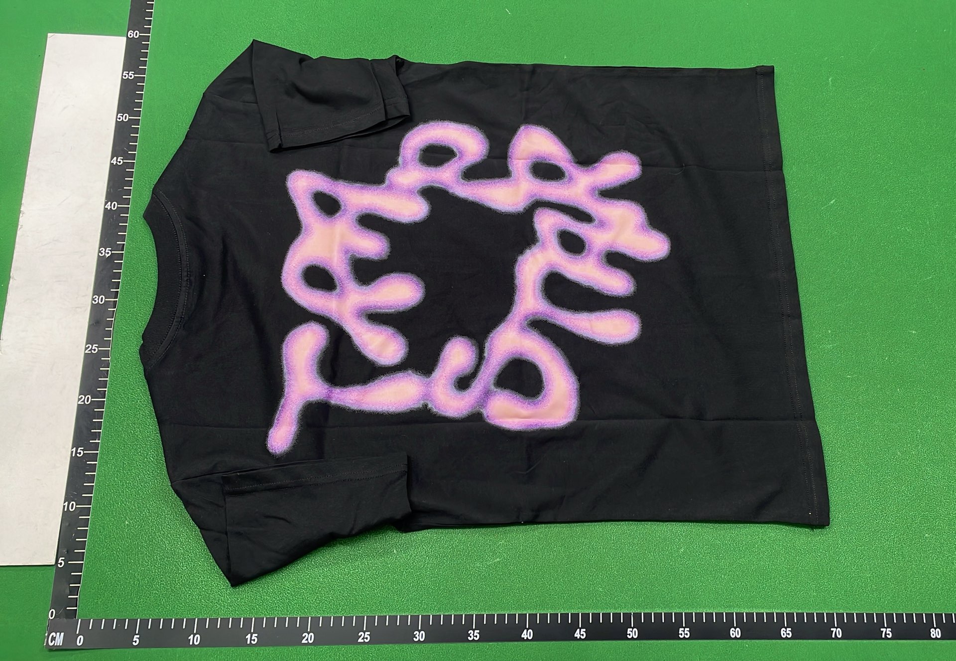 Trap Star Black T-Shirt with Purple Graphic Design