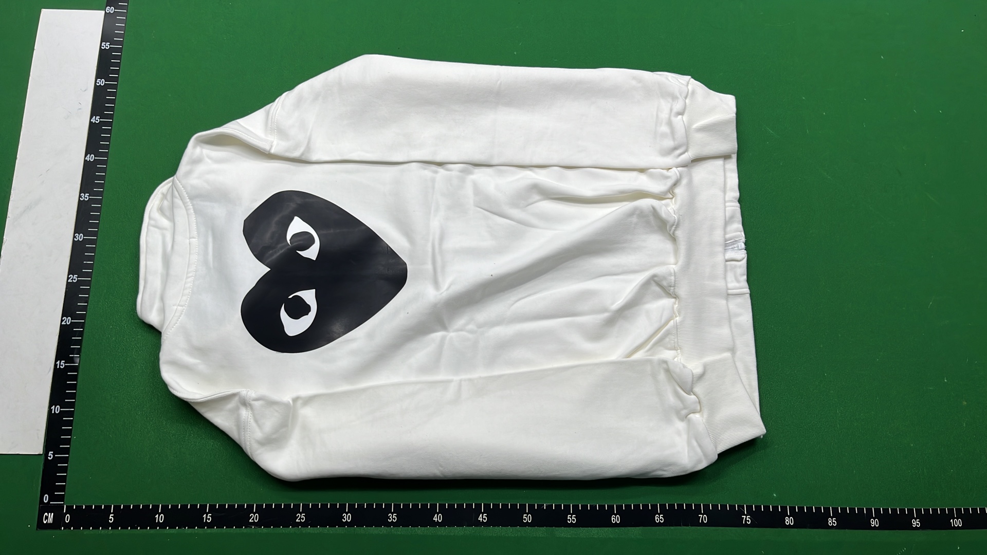 Black Hoodie with Heart Eyes Design - Front and Back View