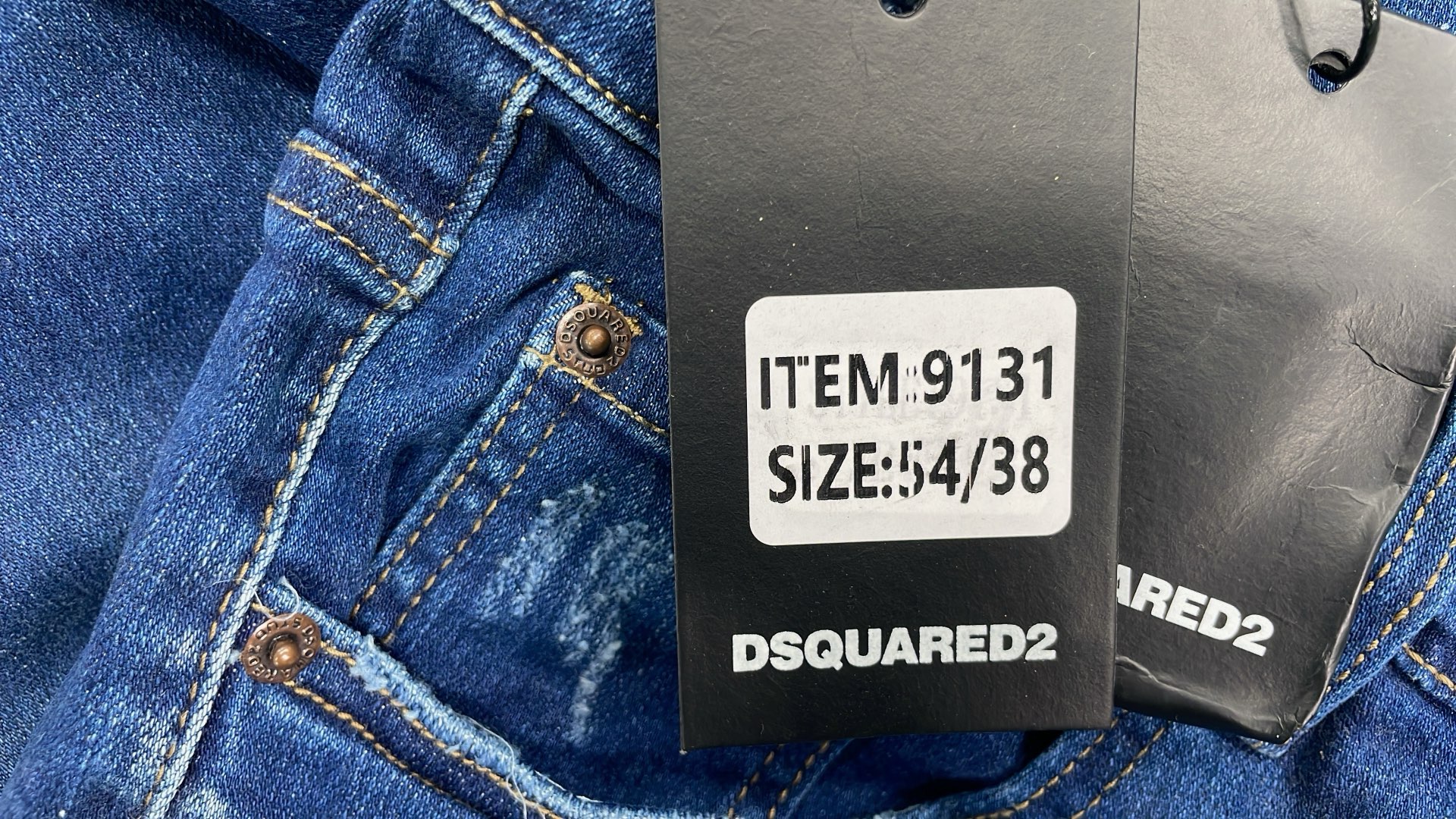 DSQUARED2 ICON Black Denim Jeans with Paint Splatter Design