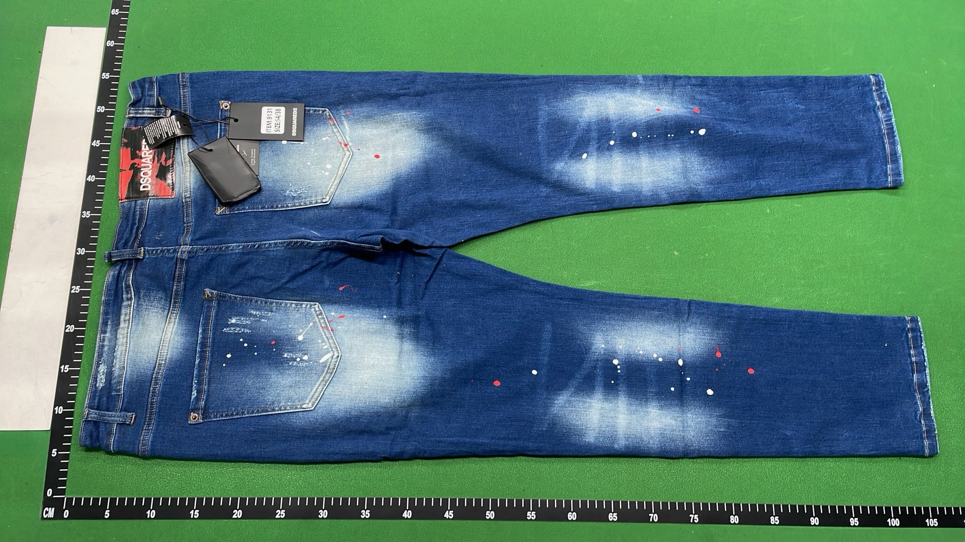 DSQUARED2 ICON Black Denim Jeans with Paint Splatter Design