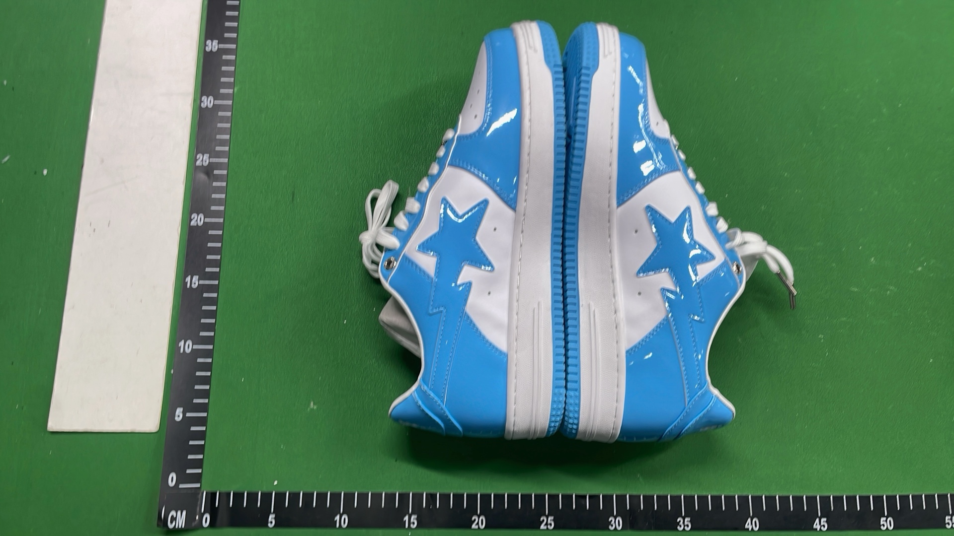 BAPE x Nike SB Dunk Low Pink Blue Star Sneakers