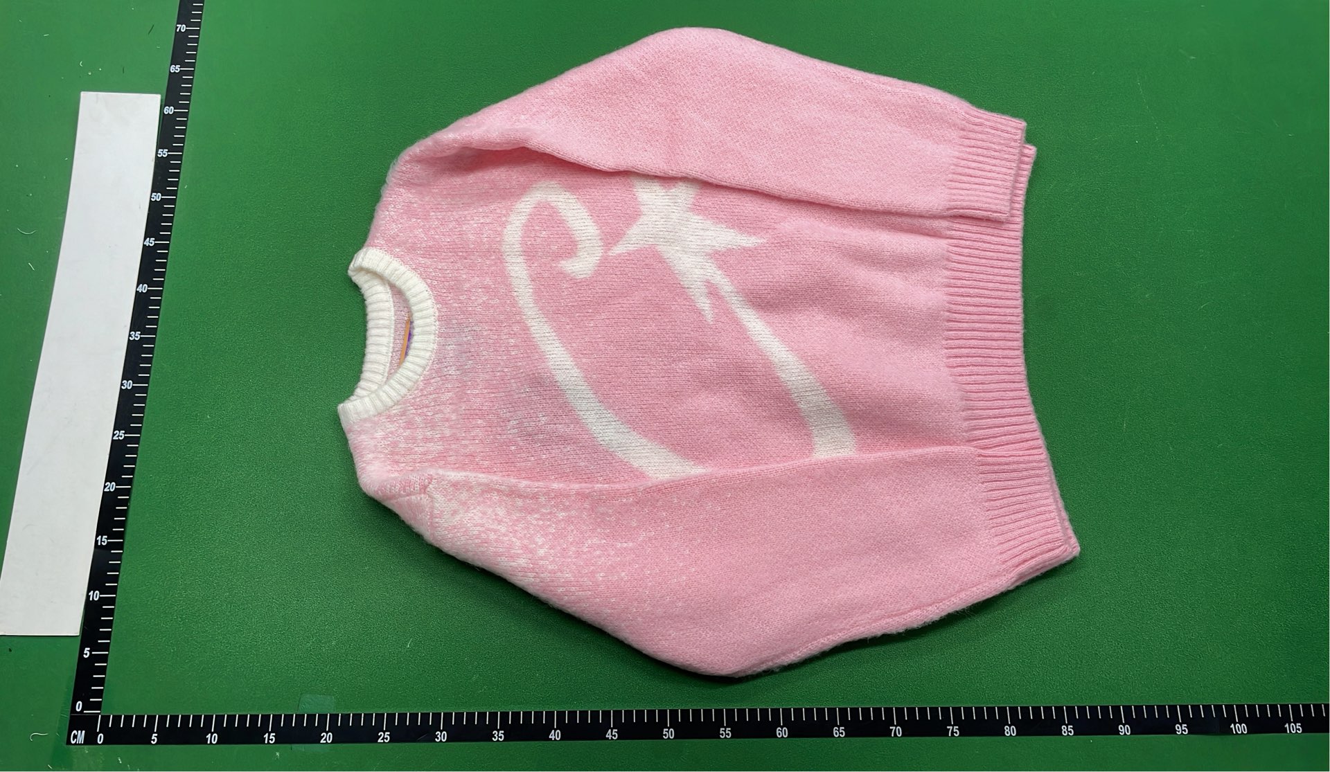Pink Knit Sweater with Abstract Pattern