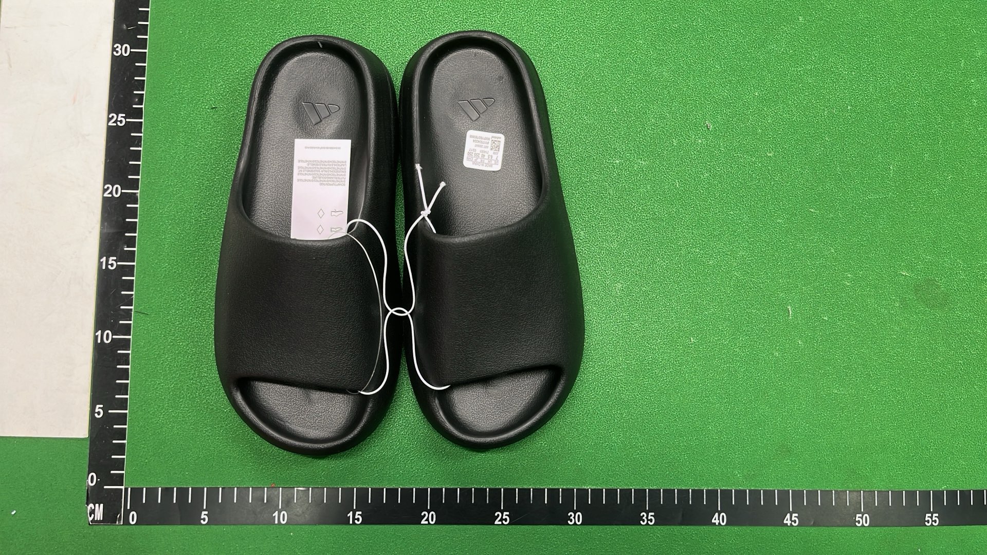 Yeezy Slide Black Slip-On Sandals by Adidas