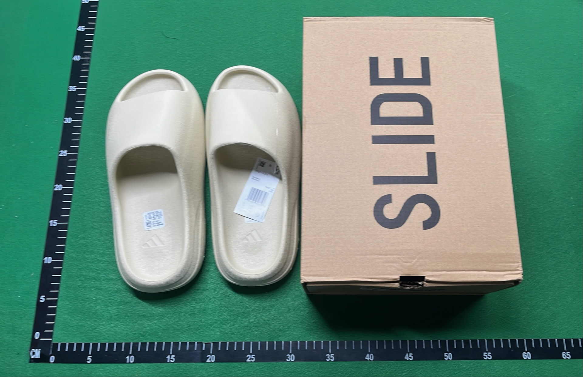 Yeezy Slide Black Slip-On Sandals by Adidas