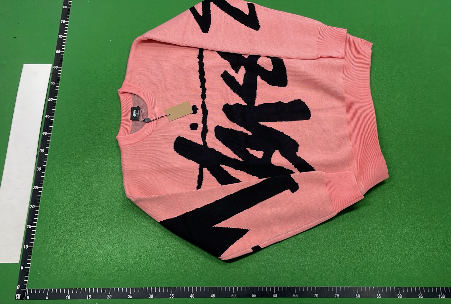 Stussy Pink Knit Sweater with Black Logo Design