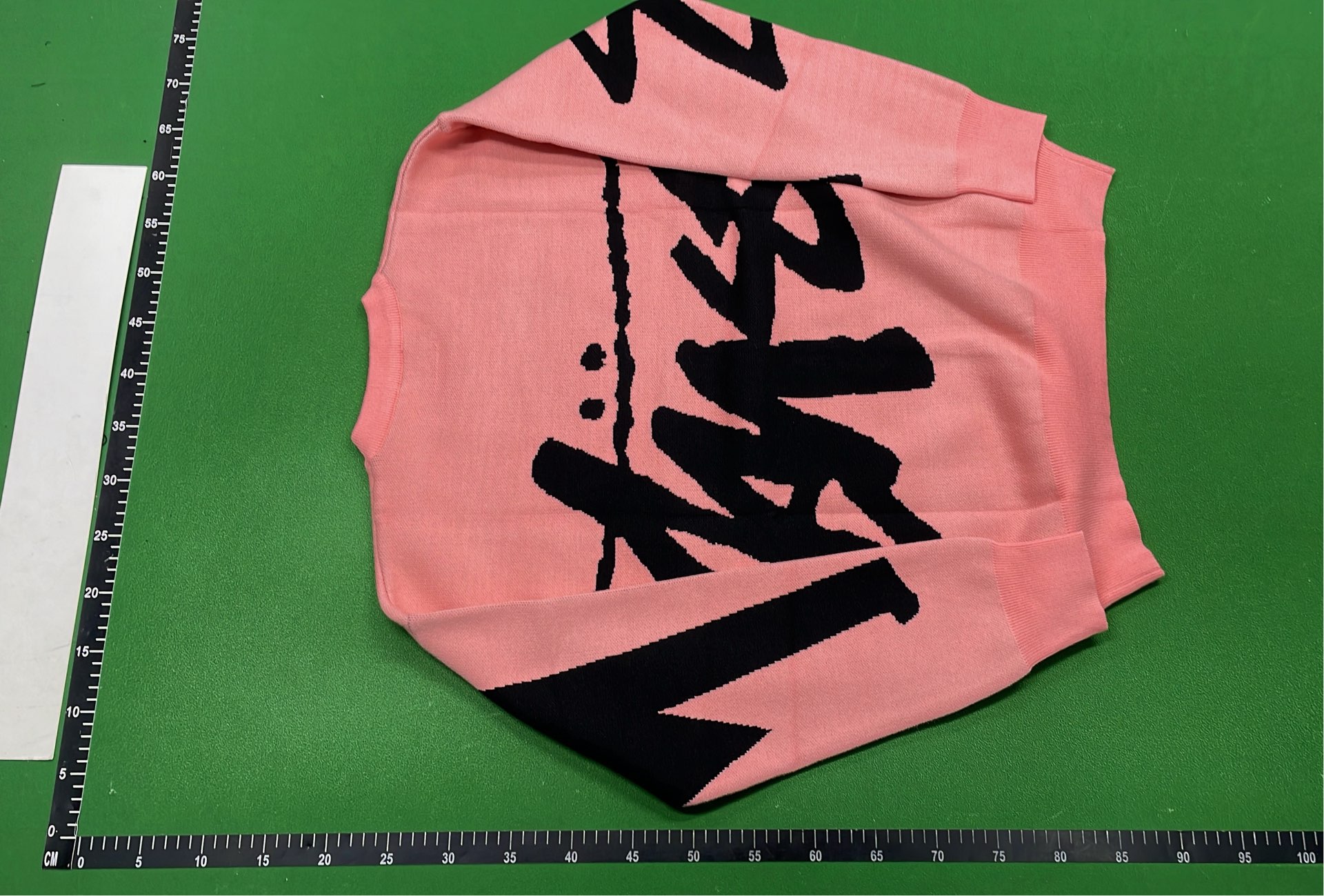 Stussy Pink Knit Sweater with Black Logo Design
