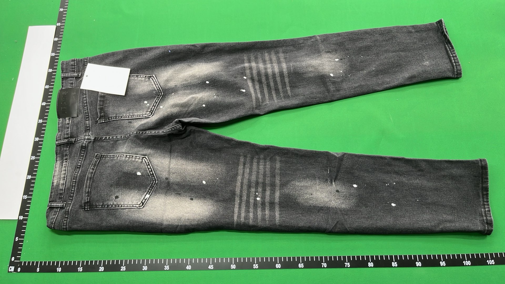 DSQUARED2 ICON Black Denim Jeans with Paint Splatter Design