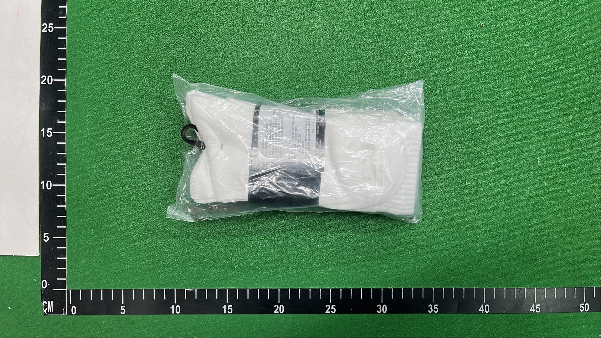 Nike Black Socks with White Swoosh Logo