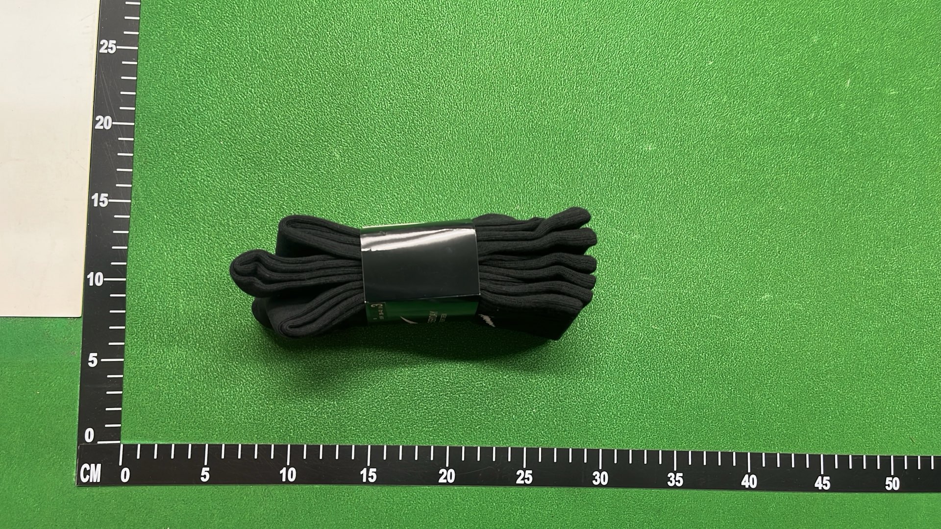 Nike Black Socks with White Swoosh Logo