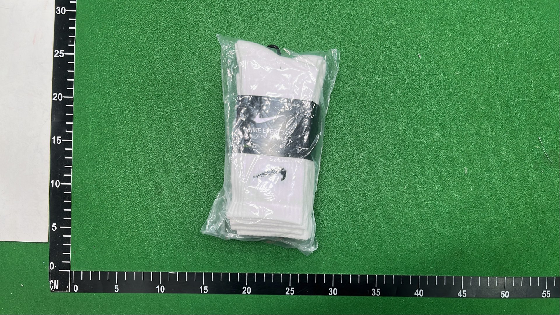 Nike Black Socks with White Swoosh Logo