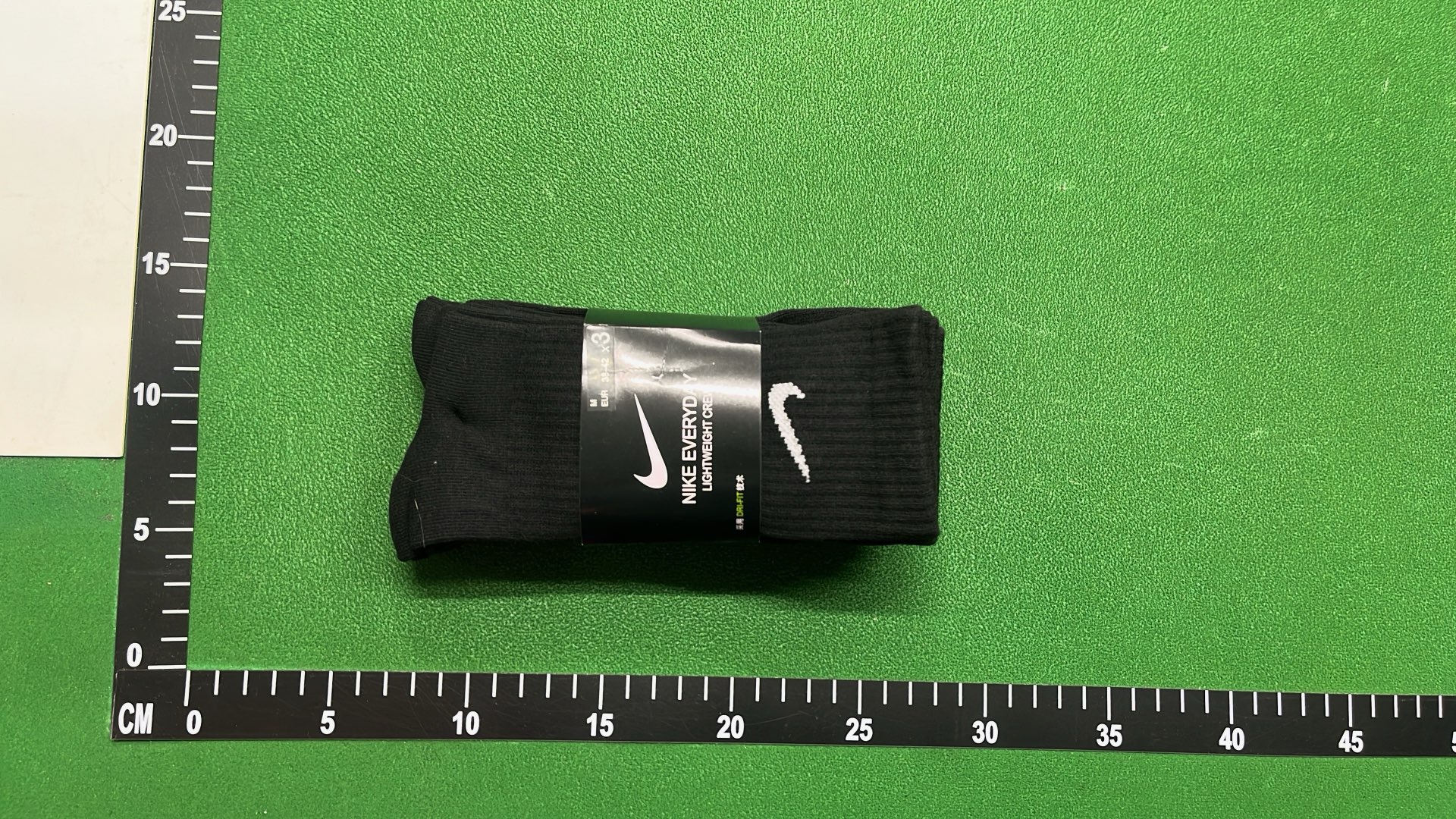 Nike Black Socks with White Swoosh Logo